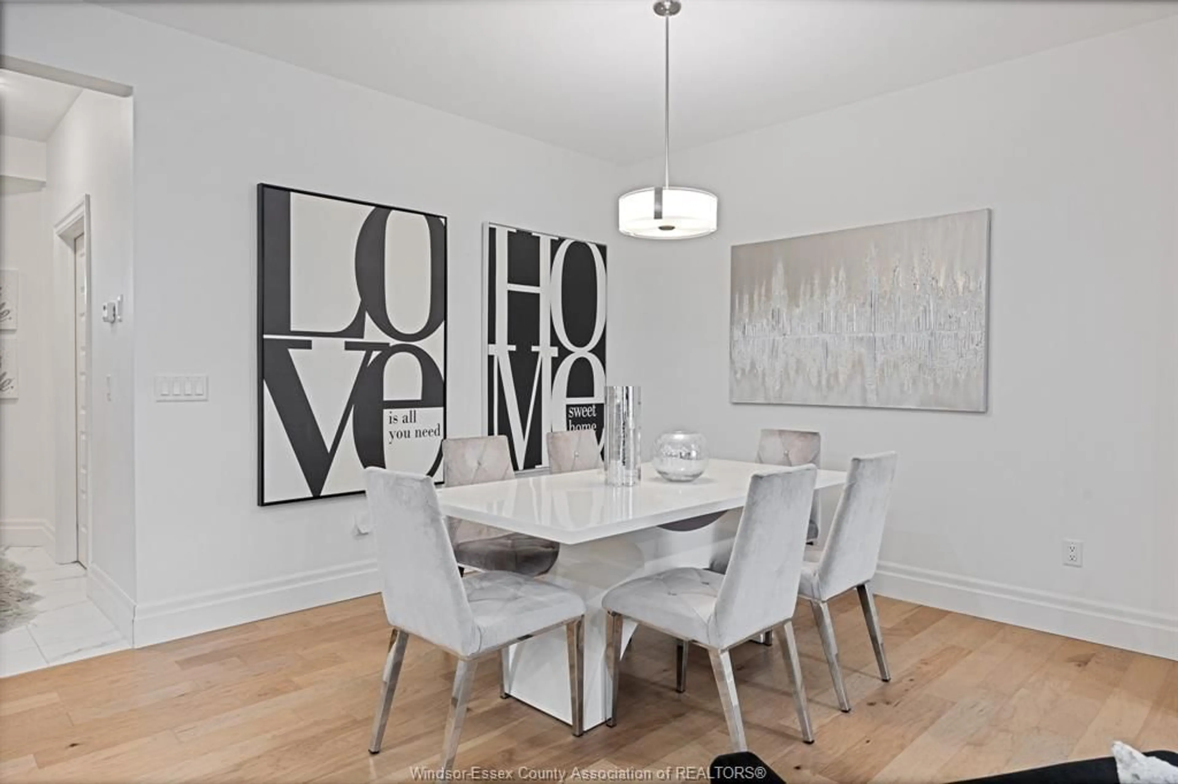 Dining room, wood/laminate floor for 116 PETERS St, Essex Ontario N8M 0B1