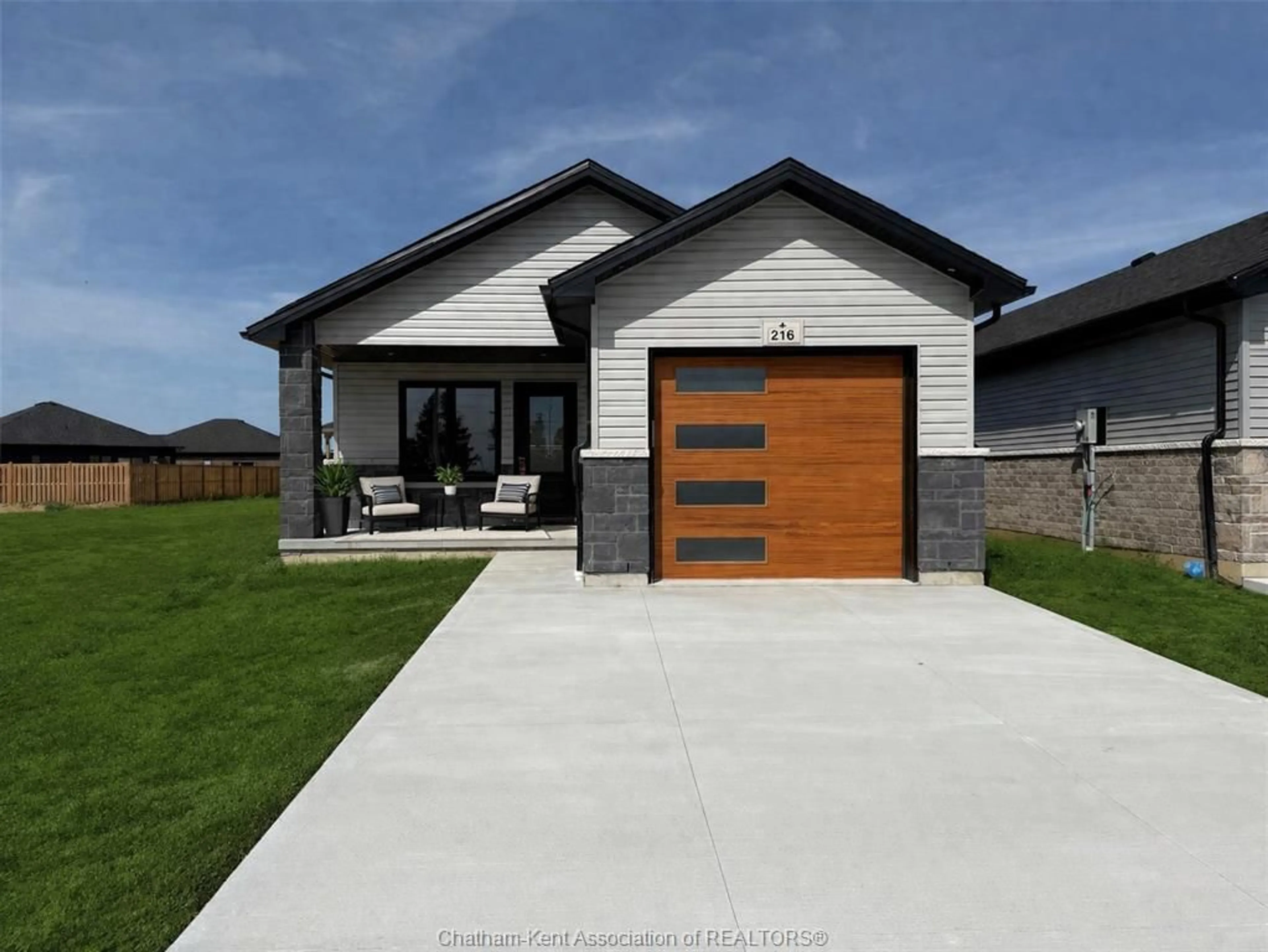 Home with brick exterior material, street for 216 IRONWOOD Trail, Chatham Ontario N7M 0T3