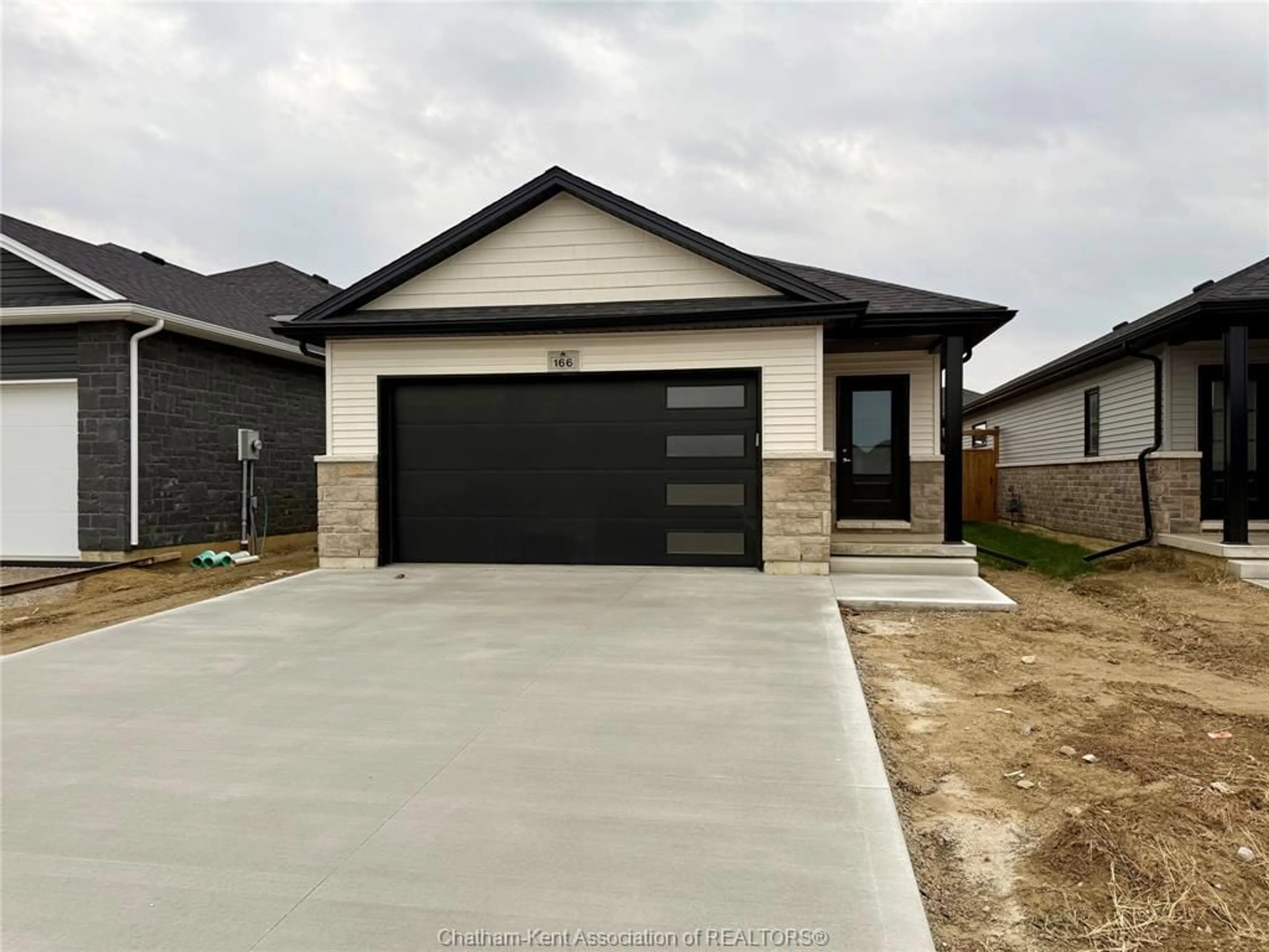 Home with brick exterior material, street for 166 IRONWOOD Trail, Chatham Ontario N7M 0T3