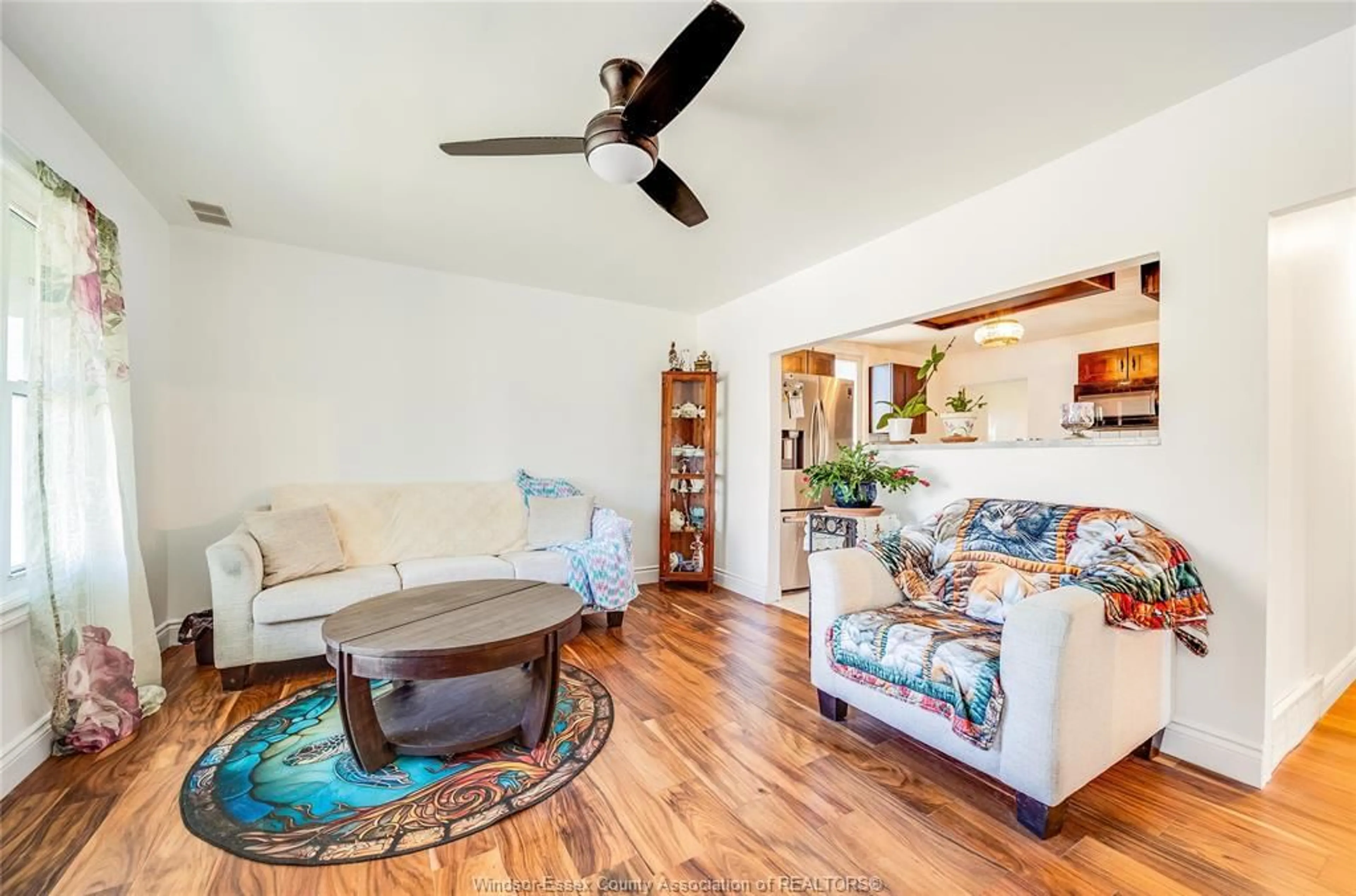 Living room with furniture, wood/laminate floor for 2286 FOREST Ave, Windsor Ontario N8W 2G6