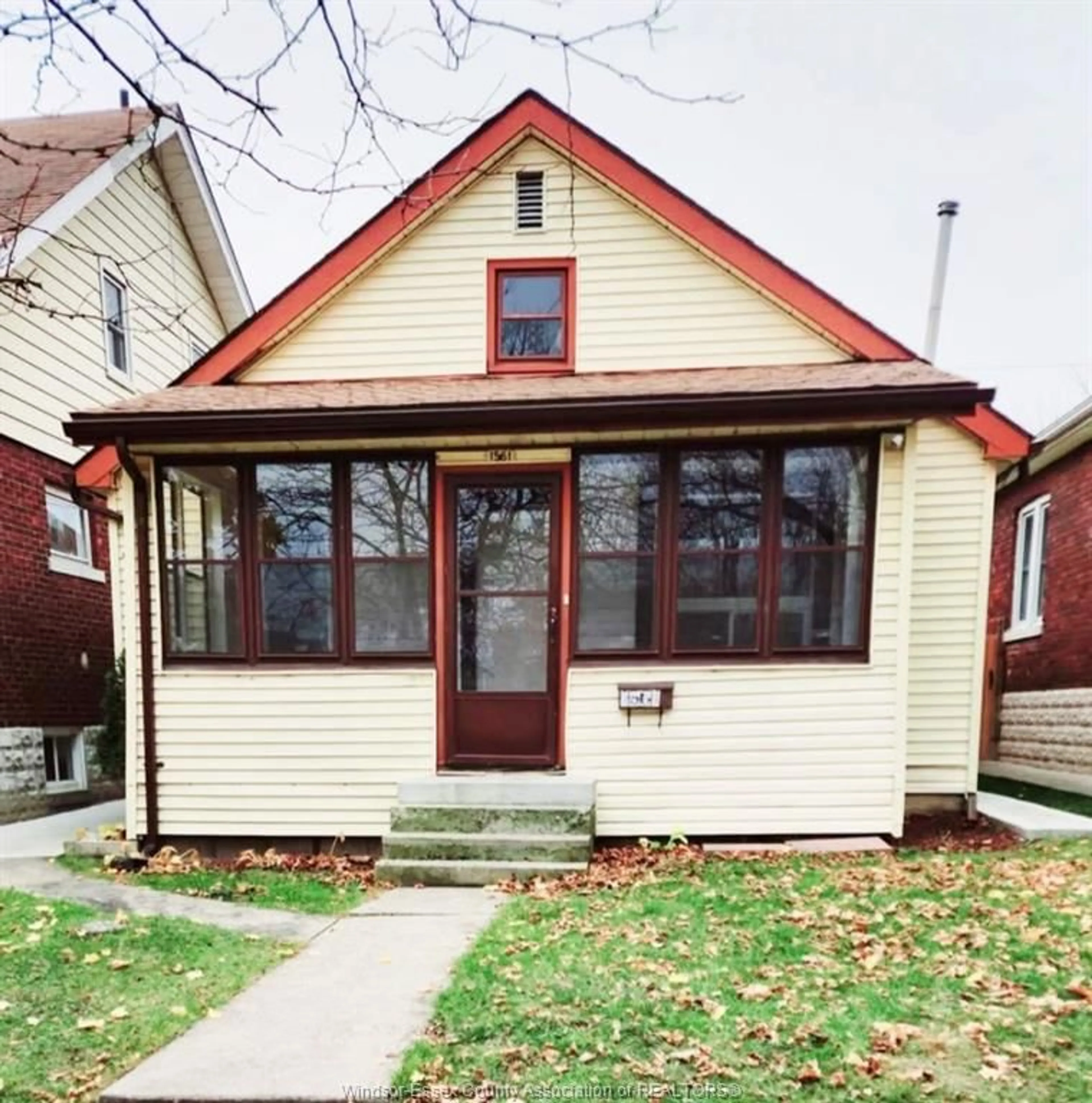 Home with vinyl exterior material, street for 1561 York St, Windsor Ontario N8X 1W5