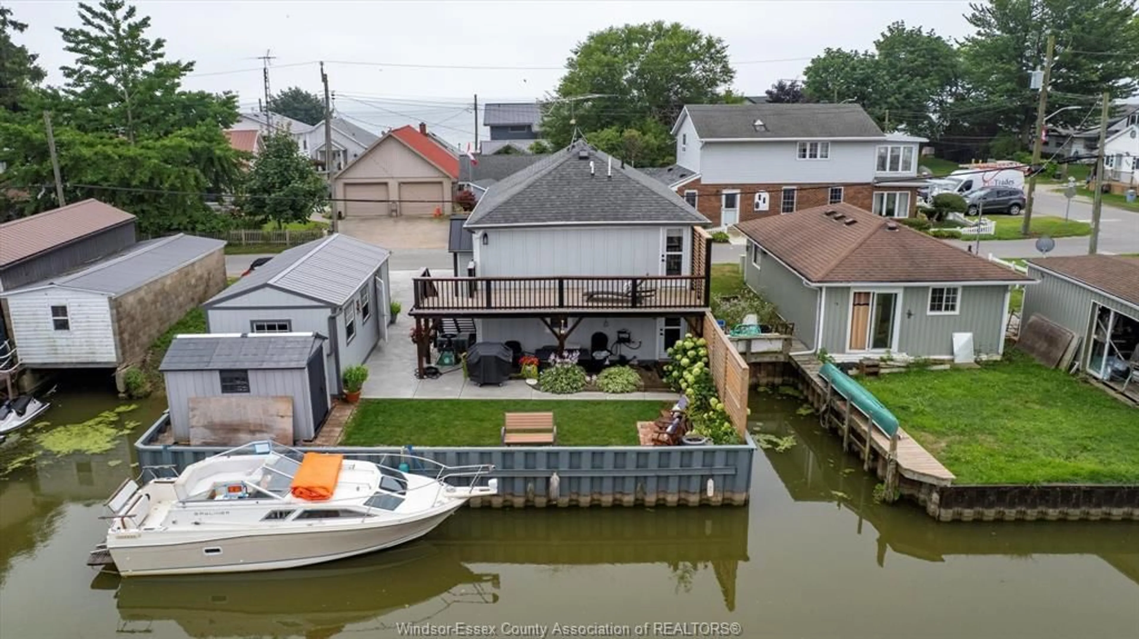 A pic from outside/outdoor area/front of a property/back of a property/a pic from drone, water/lake/river/ocean view for 848 CEDAR ISLAND Dr, Kingsville Ontario N9Y 3W1