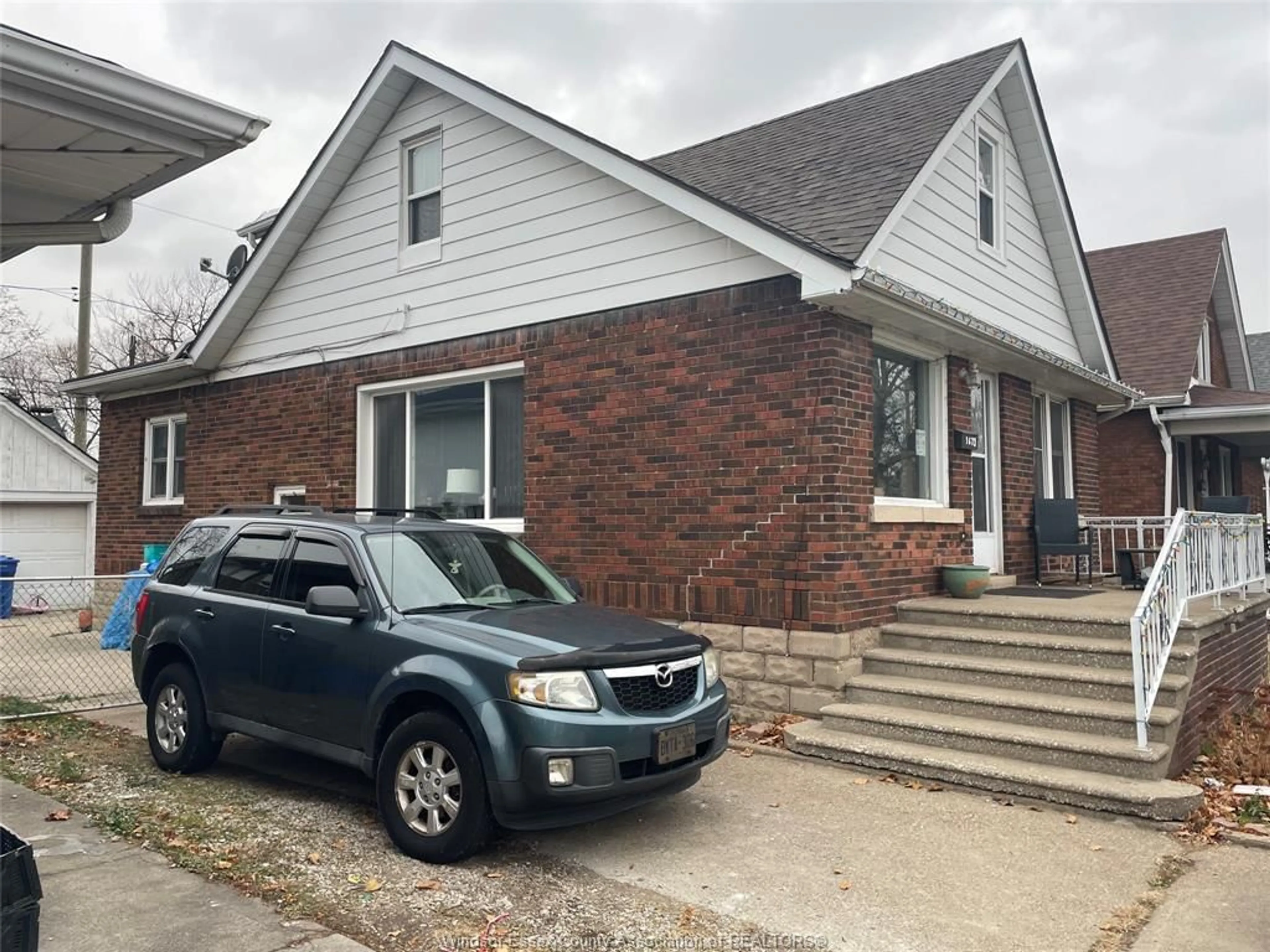 Home with brick exterior material, street for 1673 Pillette Rd, Windsor Ontario N8Y 3C4