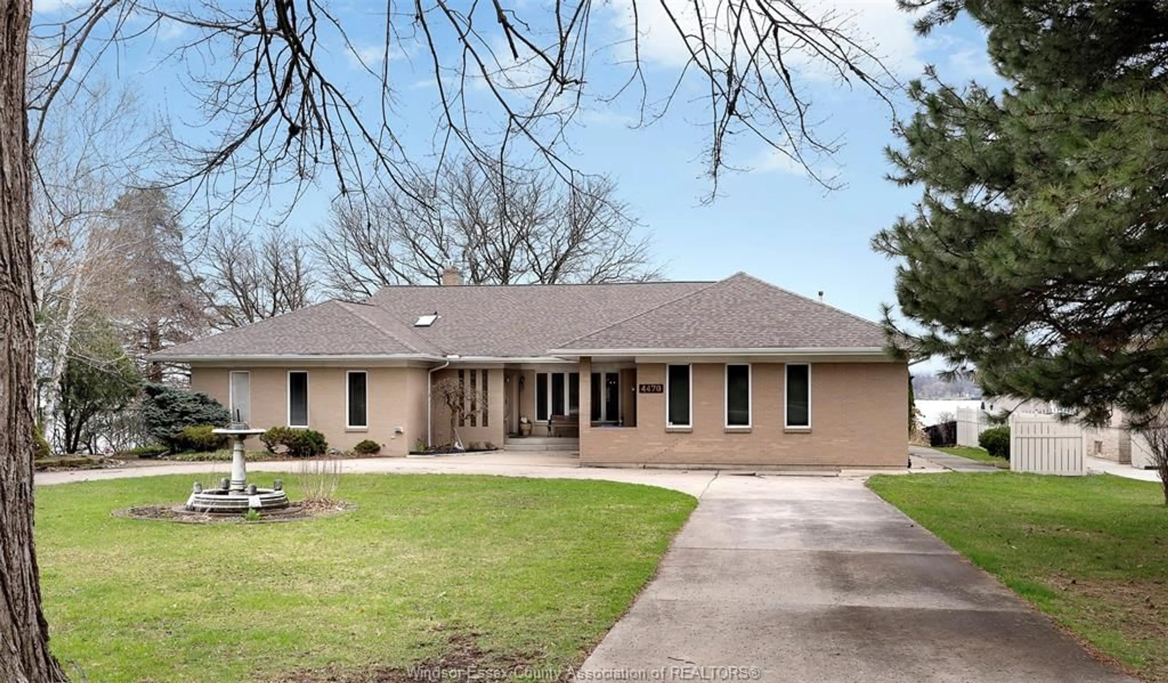 Home with brick exterior material, street for 4470 Riverside, Windsor Ontario N8Y 1B8