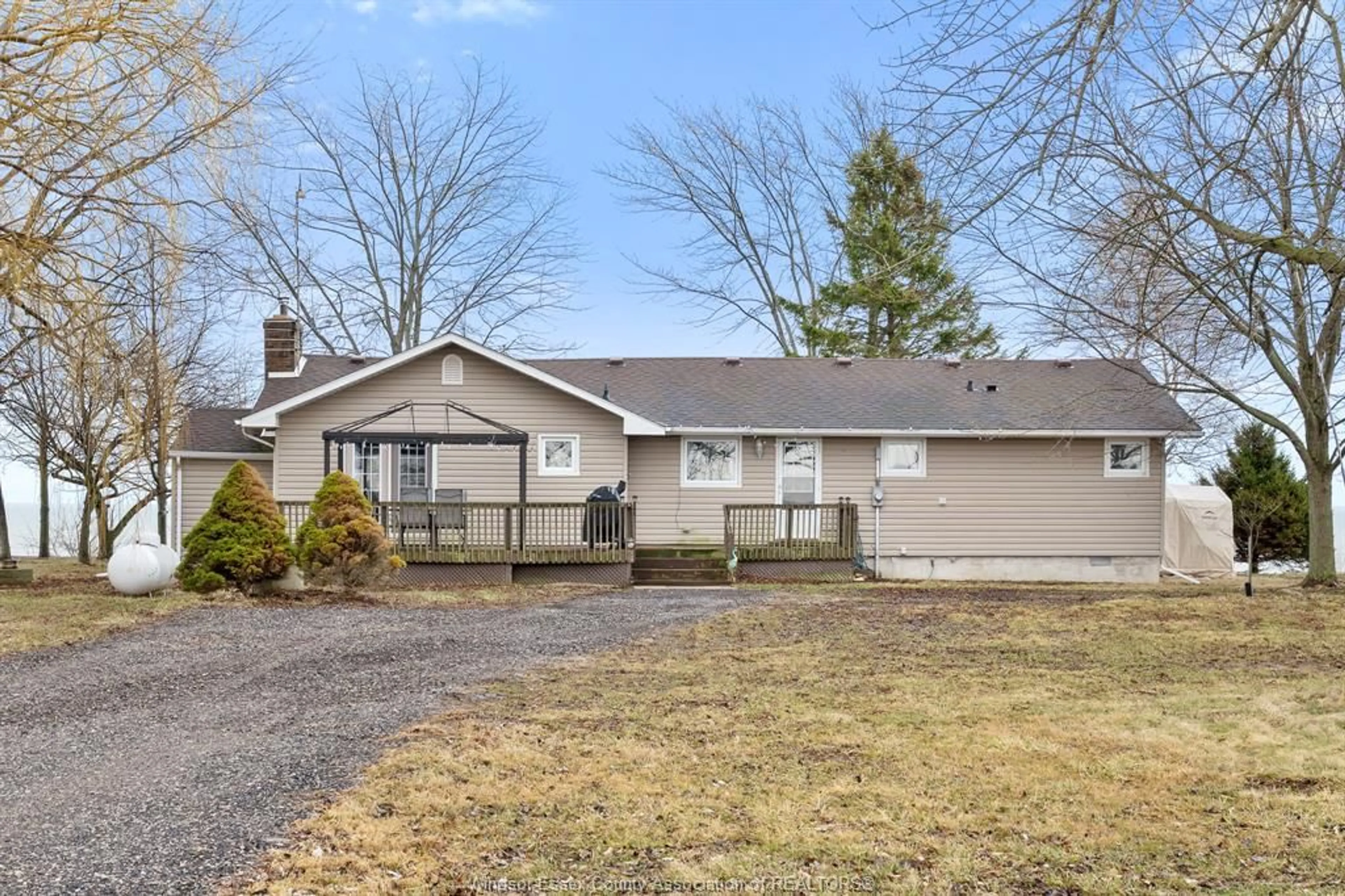 Home with vinyl exterior material, street for 1956 Ocean Blvd, Wheatley Ontario N0P 2P0