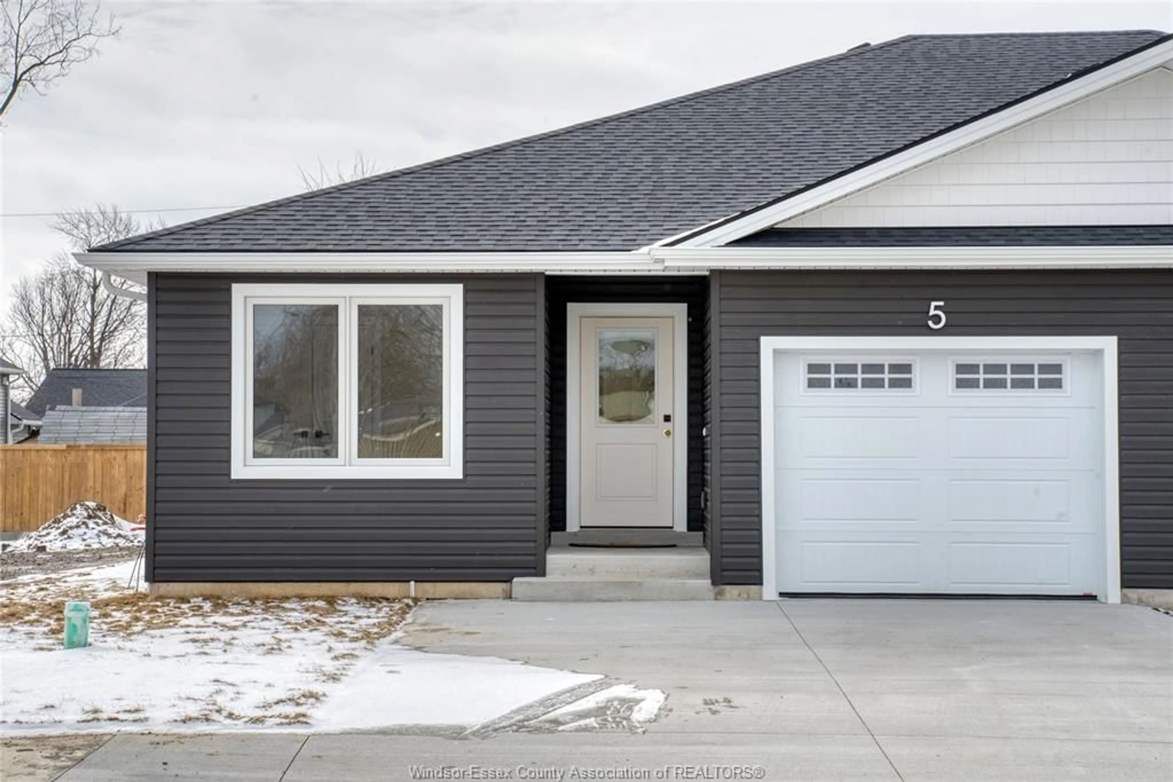 Home with vinyl exterior material, street for 5 SARKIS St, Kingsville Ontario N9Y 1J9