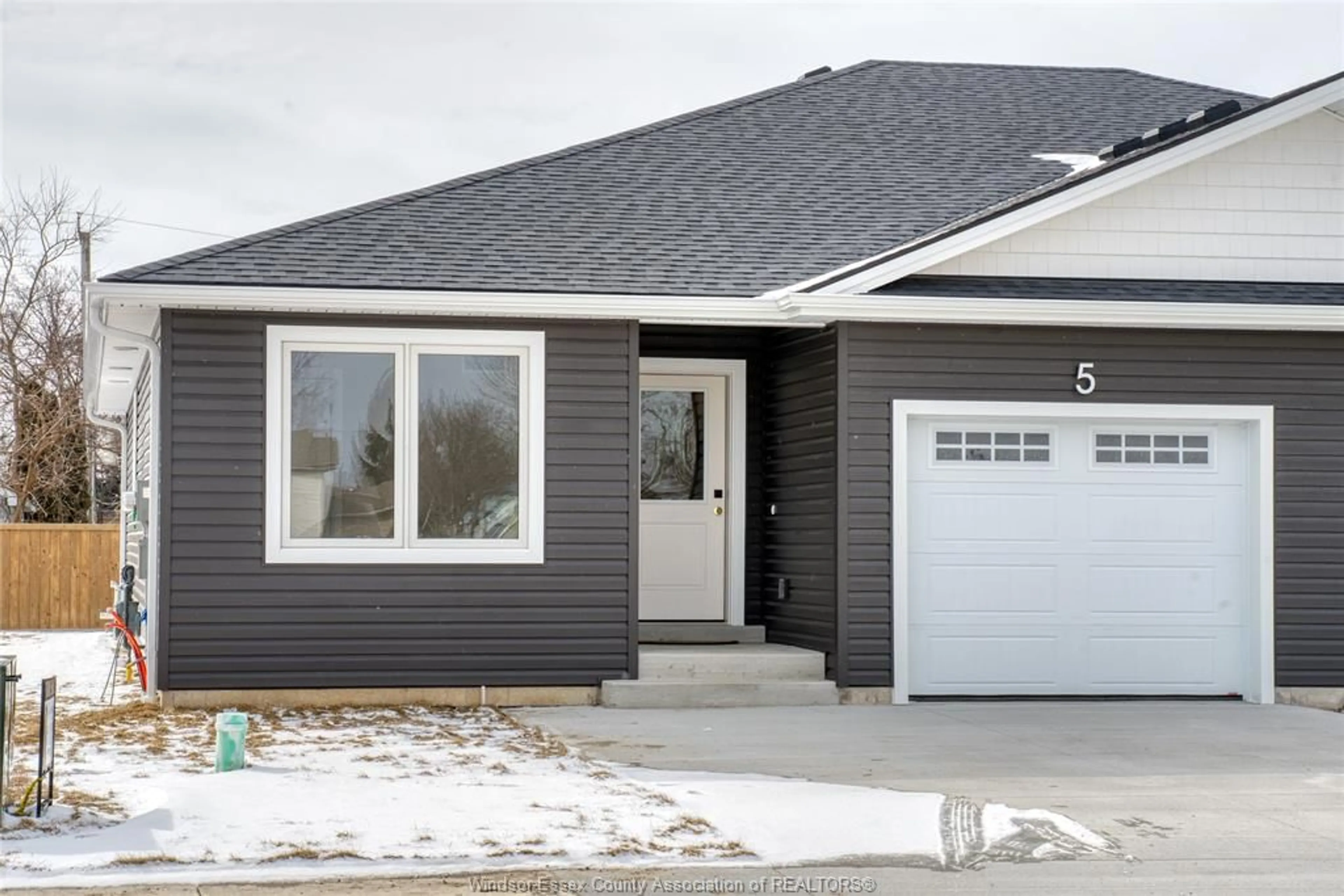 Home with vinyl exterior material, street for 5 SARKIS St, Kingsville Ontario N9Y 1J9