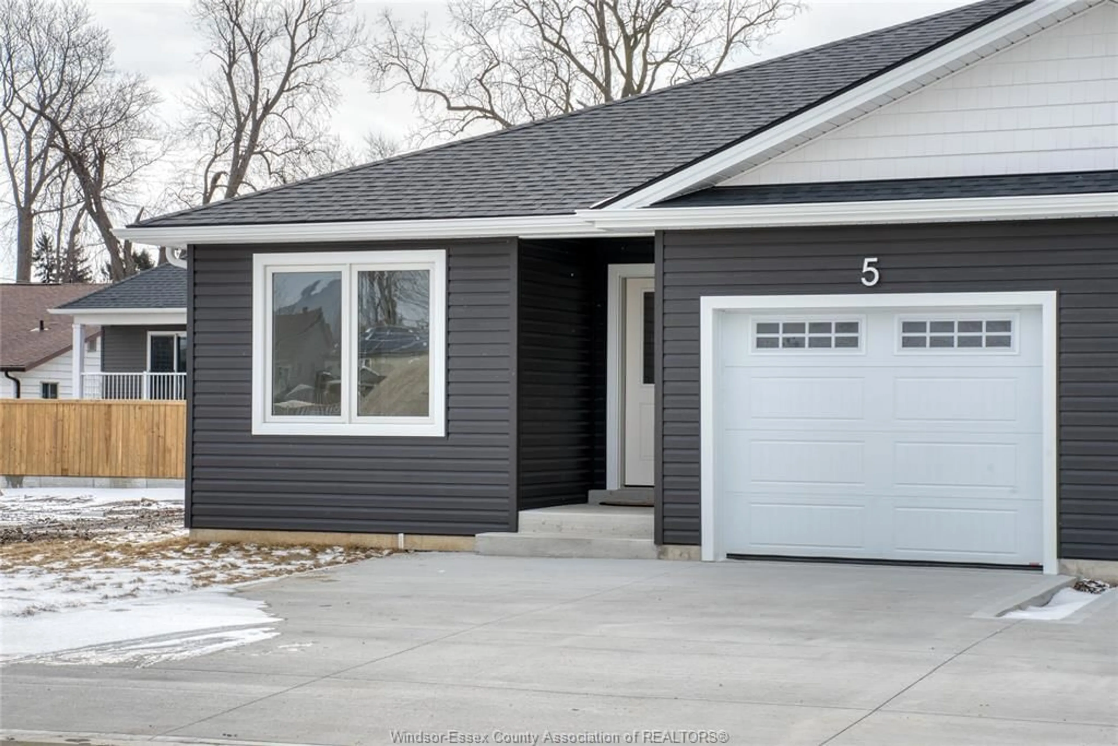 Home with vinyl exterior material, street for 5 SARKIS St, Kingsville Ontario N9Y 1J9