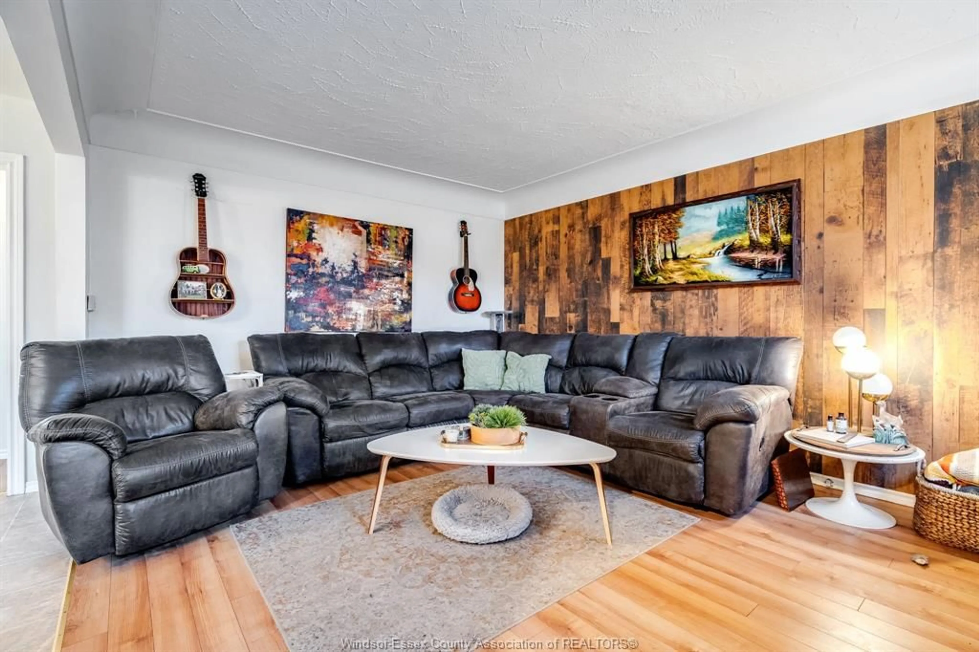 Living room with furniture, wood/laminate floor for 6 Standaert Rd, Chatham Ontario N7M 5J7