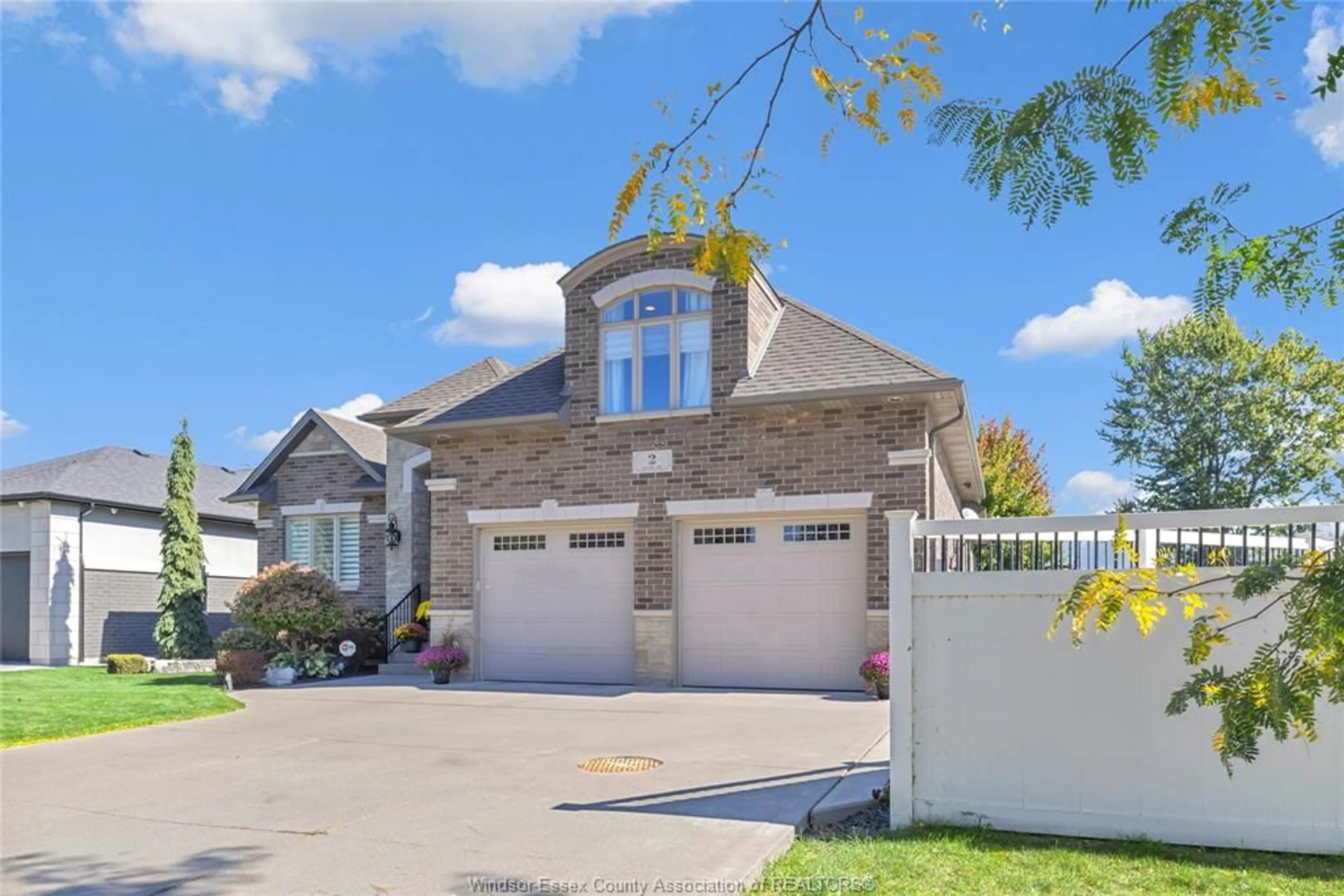 Home with brick exterior material, street for 2 MALIBU Dr, Leamington Ontario N8H 5G4