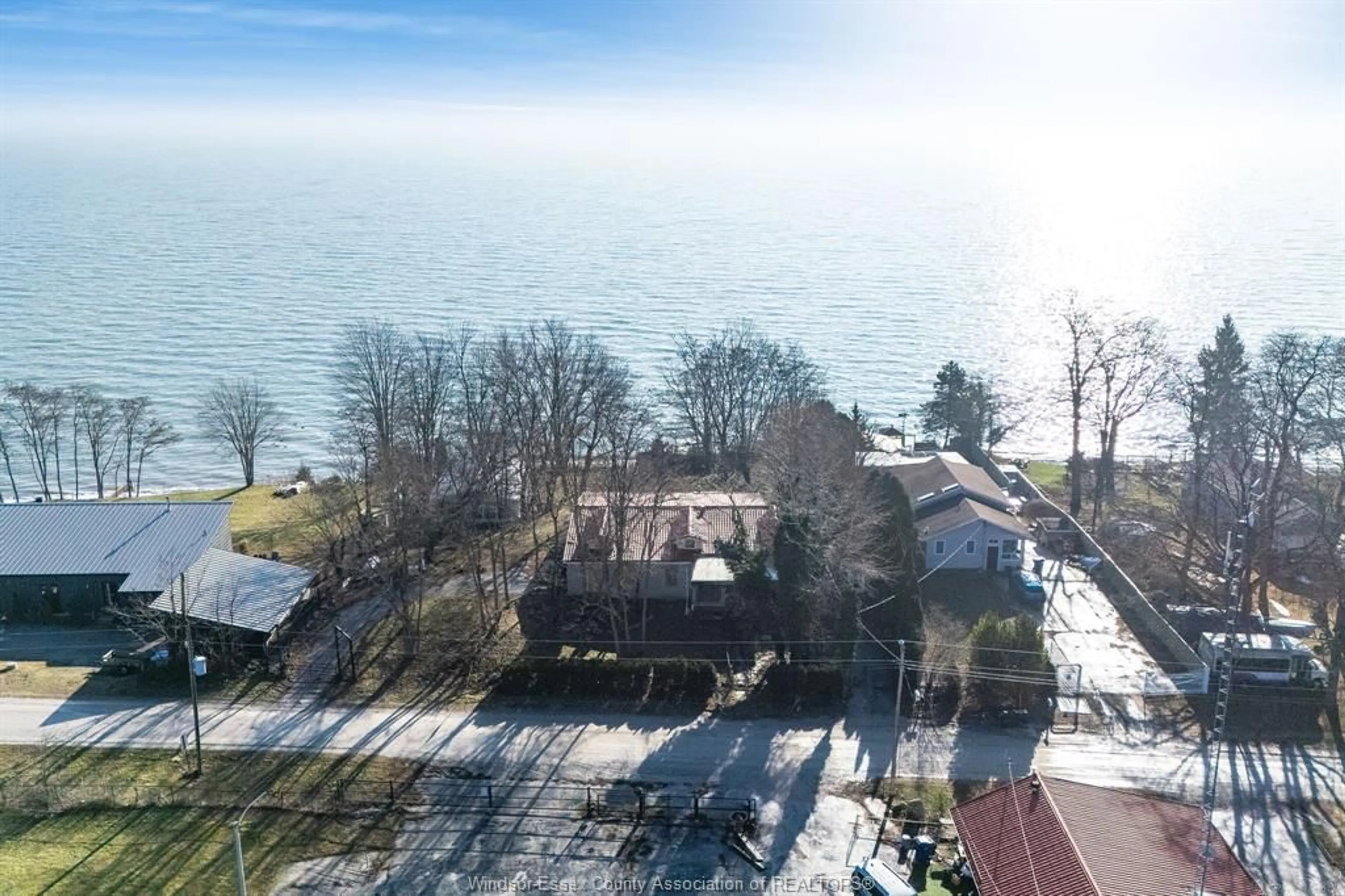 A pic from outside/outdoor area/front of a property/back of a property/a pic from drone, water/lake/river/ocean view for 20874 Cemetery Rd, Wheatley Ontario N0P 2P0