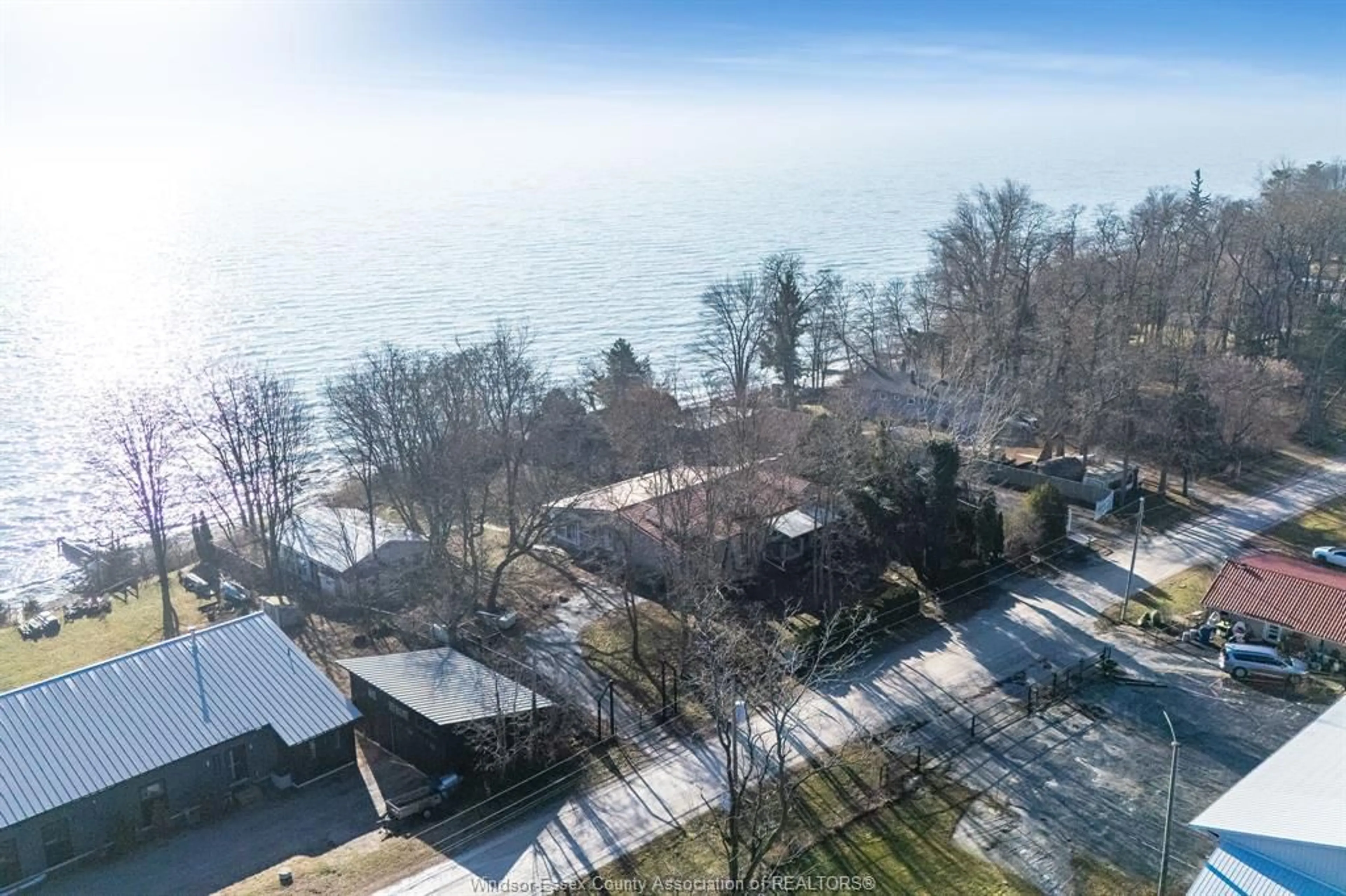 A pic from outside/outdoor area/front of a property/back of a property/a pic from drone, water/lake/river/ocean view for 20874 Cemetery Rd, Wheatley Ontario N0P 2P0