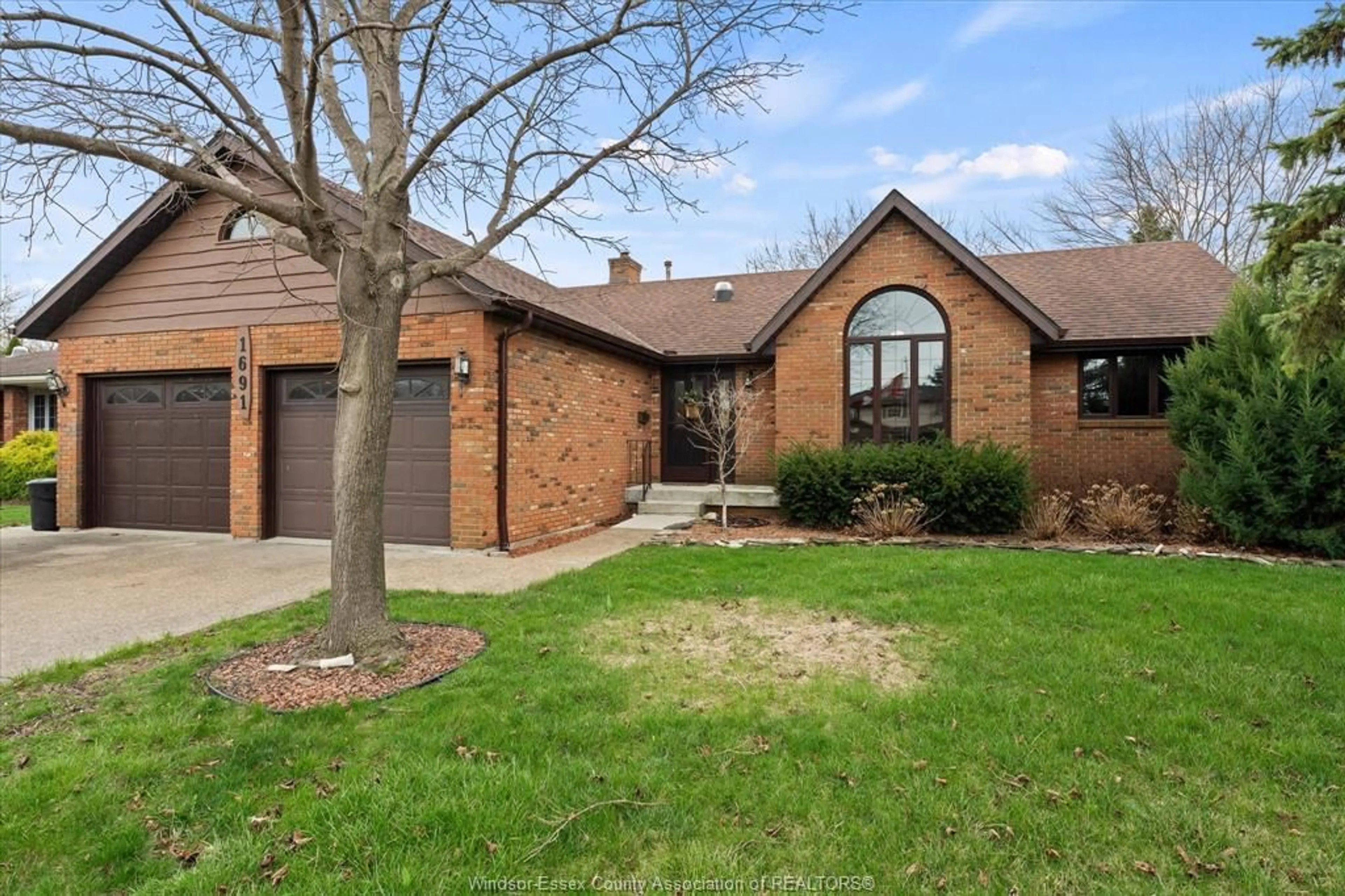 Home with brick exterior material, street for 1691 MAPLEWOOD, Lakeshore Ontario N8L 1C2