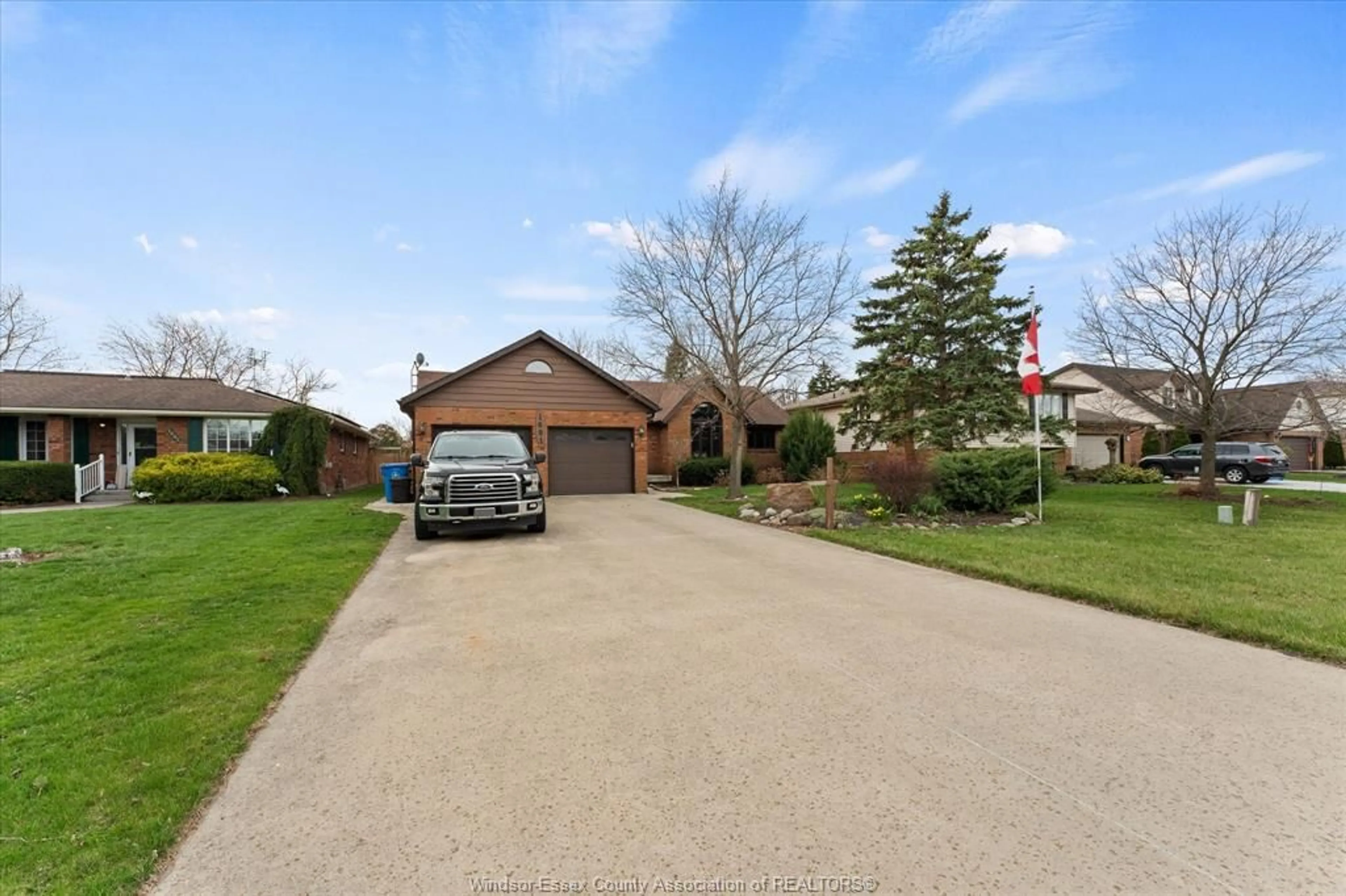 A pic from outside/outdoor area/front of a property/back of a property/a pic from drone, street for 1691 MAPLEWOOD, Lakeshore Ontario N8L 1C2