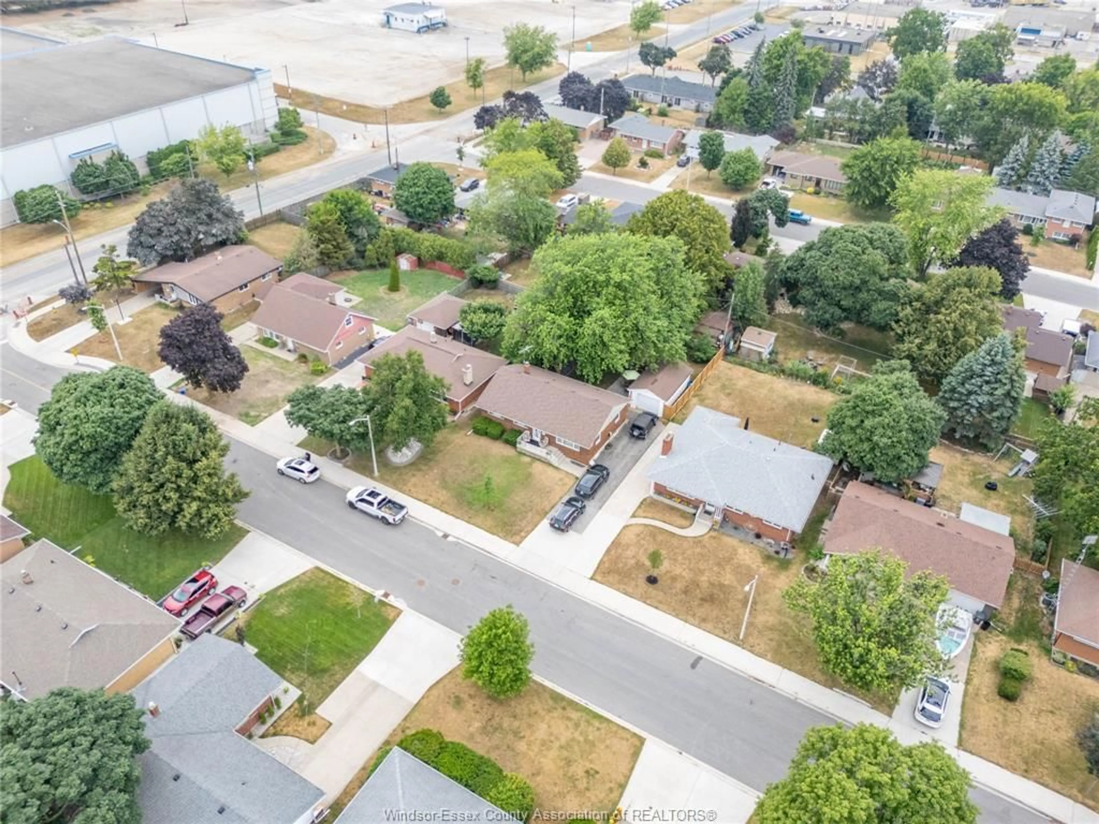 A pic from outside/outdoor area/front of a property/back of a property/a pic from drone, street for 7 GLADSTONE Ave, Leamington Ontario N9Y 2H4