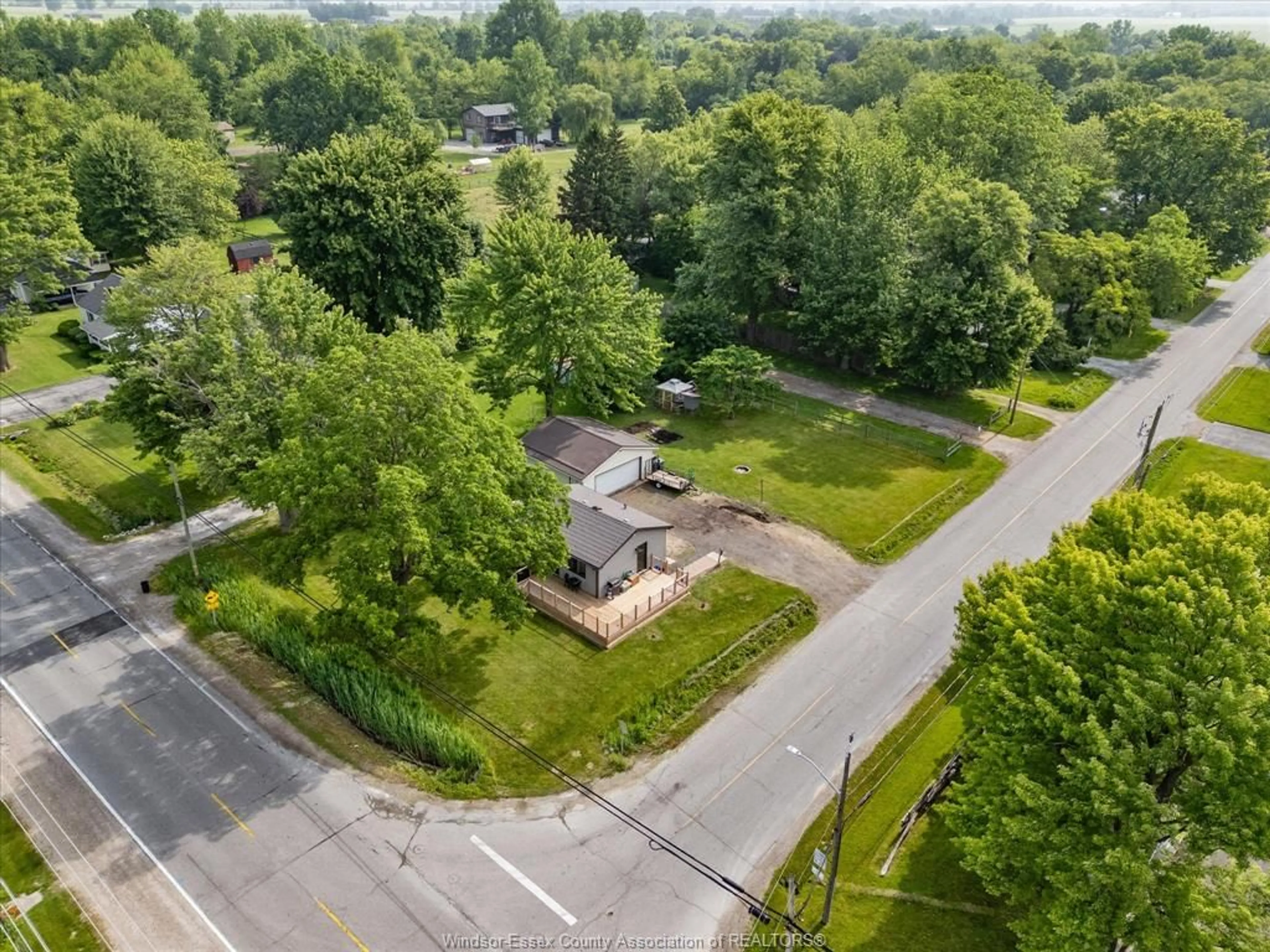 A pic from outside/outdoor area/front of a property/back of a property/a pic from drone, street for 8650 Malden Rd, LaSalle Ontario N9J 2V7