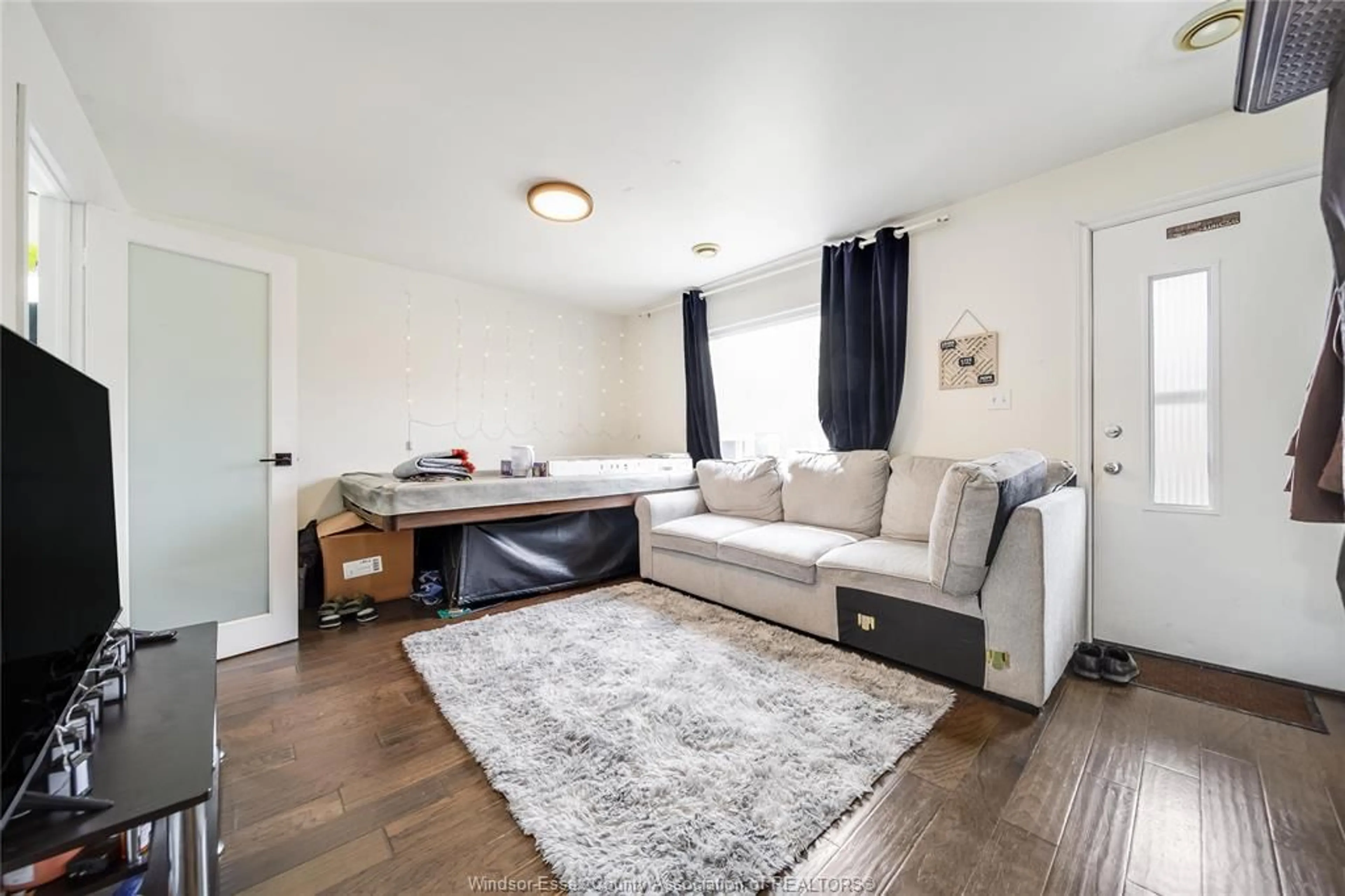 Living room with furniture, unknown for 744 MCDOUGALL St, Windsor Ontario N9A 1L8