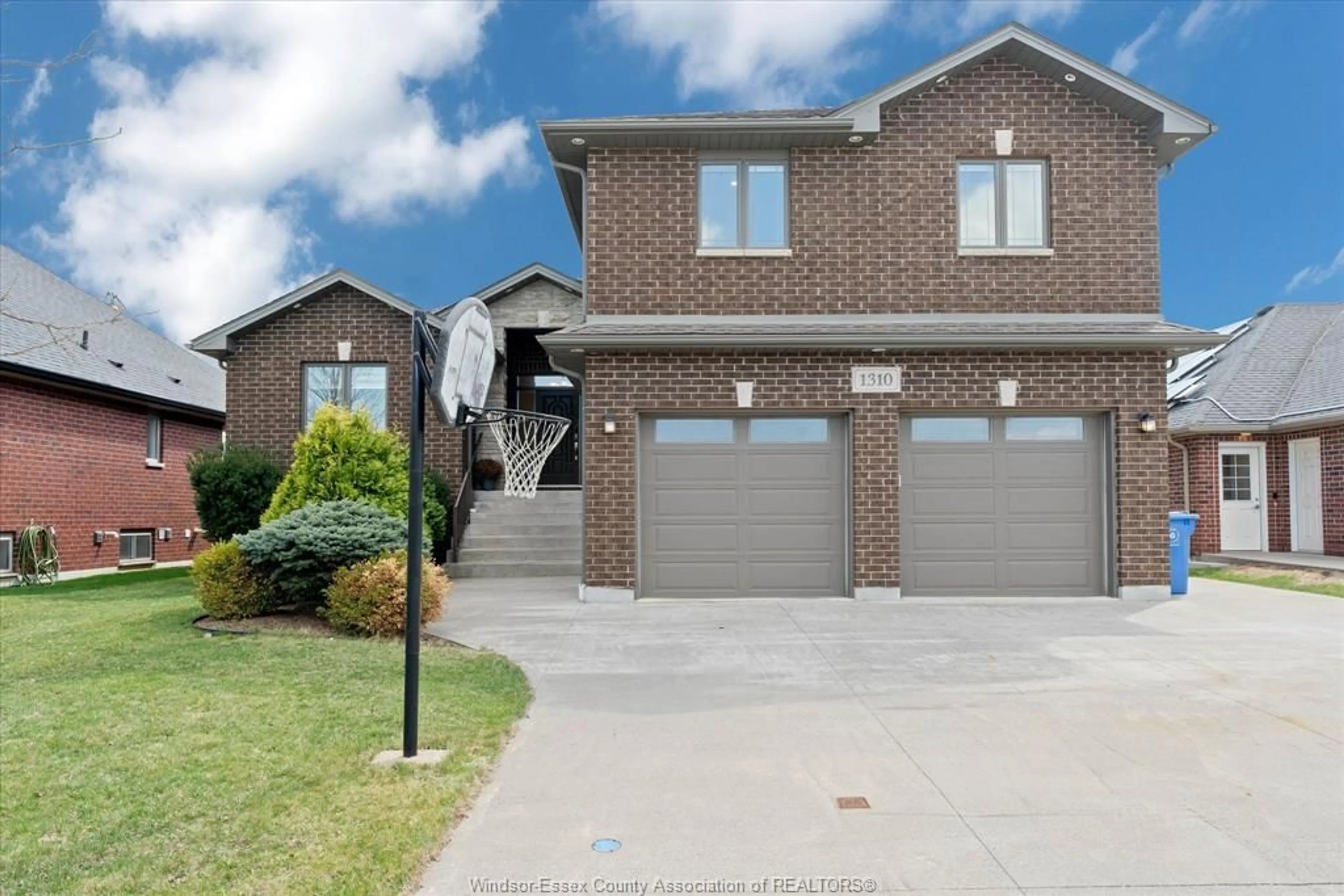 Home with brick exterior material, street for 1310 DEER RUN Trail, Lakeshore Ontario N0R 1V0