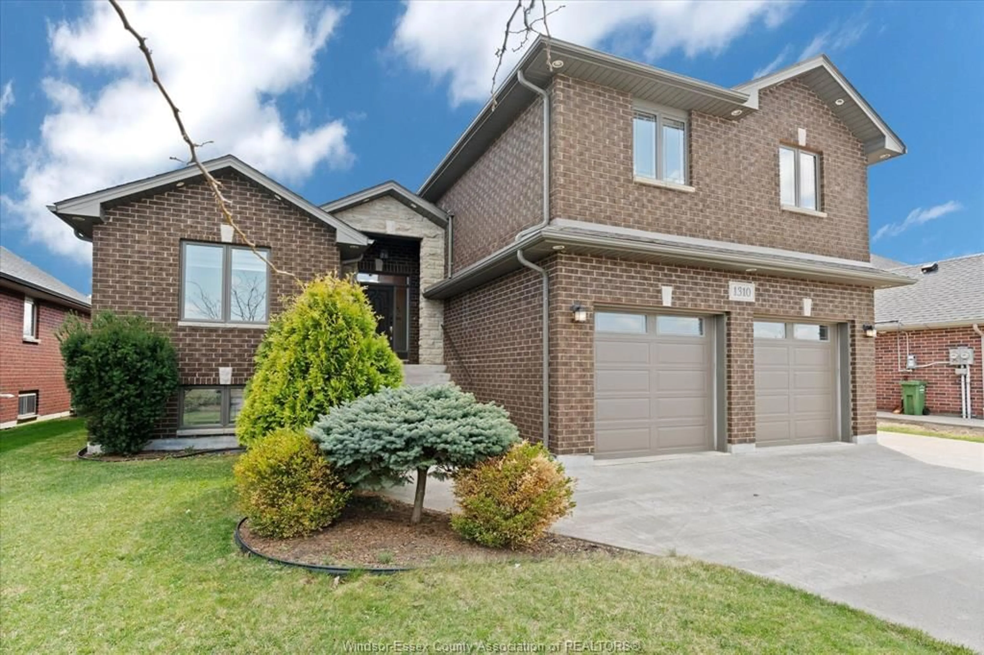 Home with brick exterior material, street for 1310 DEER RUN Trail, Lakeshore Ontario N0R 1V0
