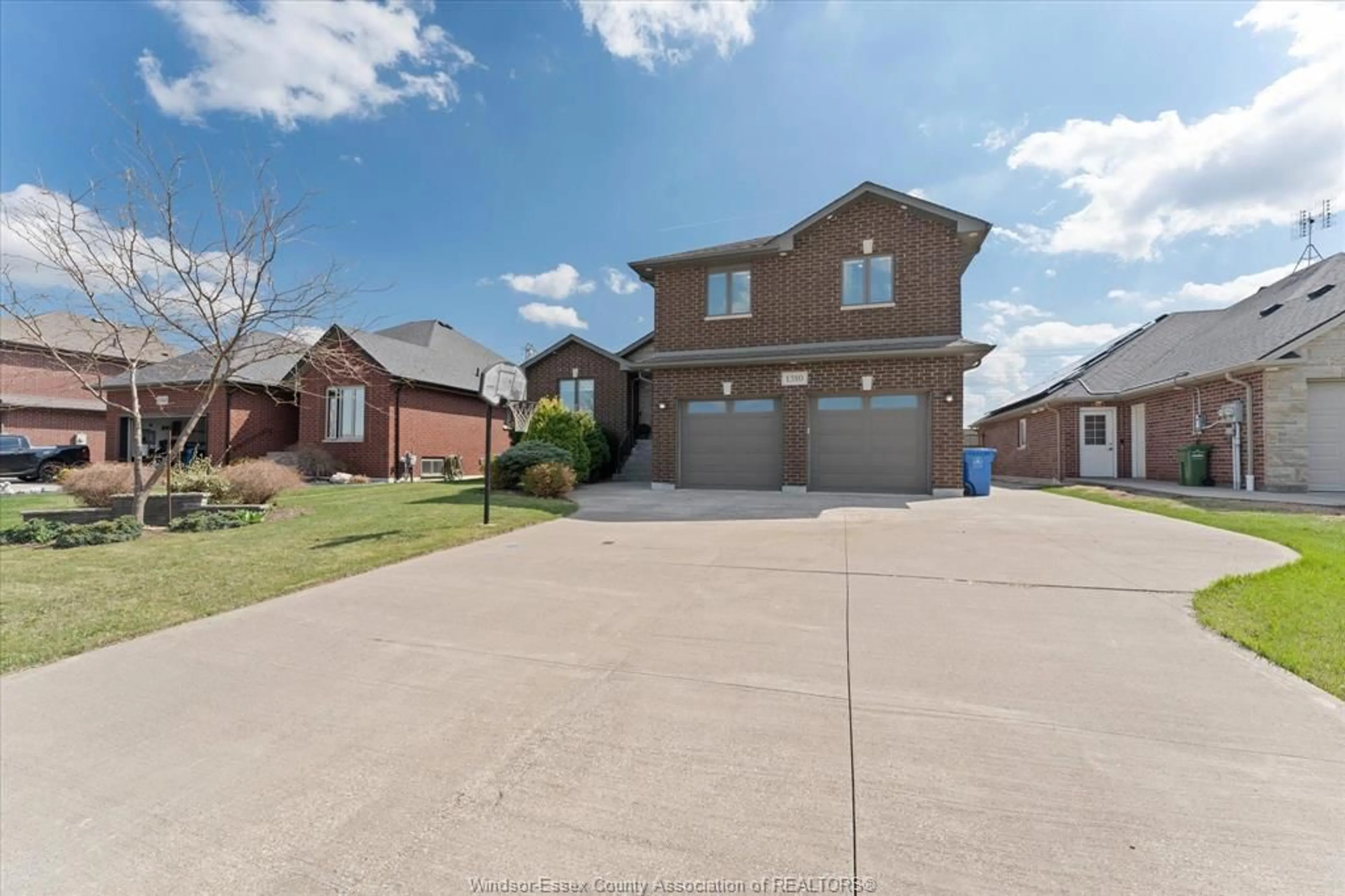 A pic from outside/outdoor area/front of a property/back of a property/a pic from drone, street for 1310 DEER RUN Trail, Lakeshore Ontario N0R 1V0