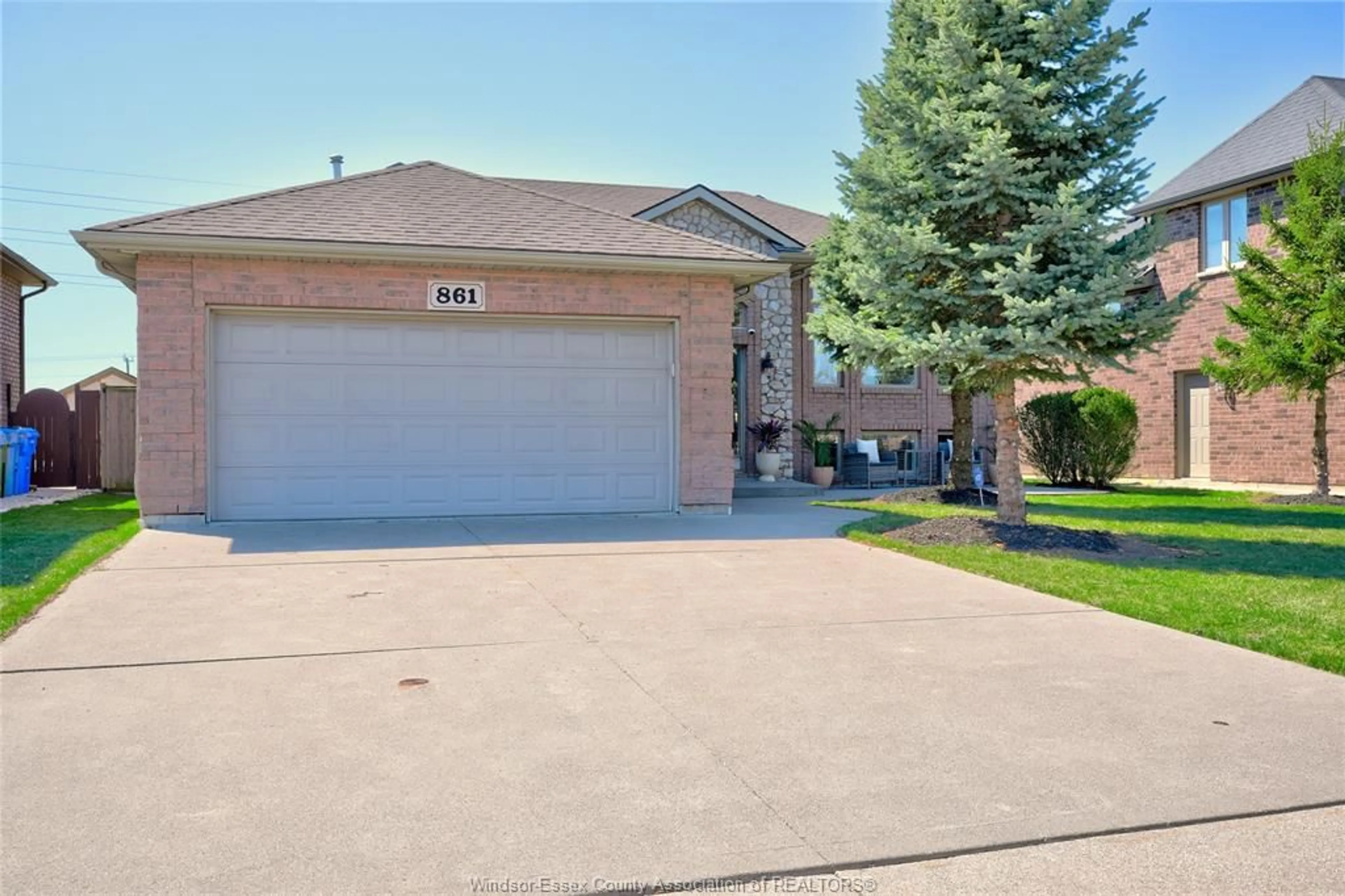 Home with brick exterior material, street for 861 SOUTHWOOD Dr, Lakeshore Ontario N8L 1G1