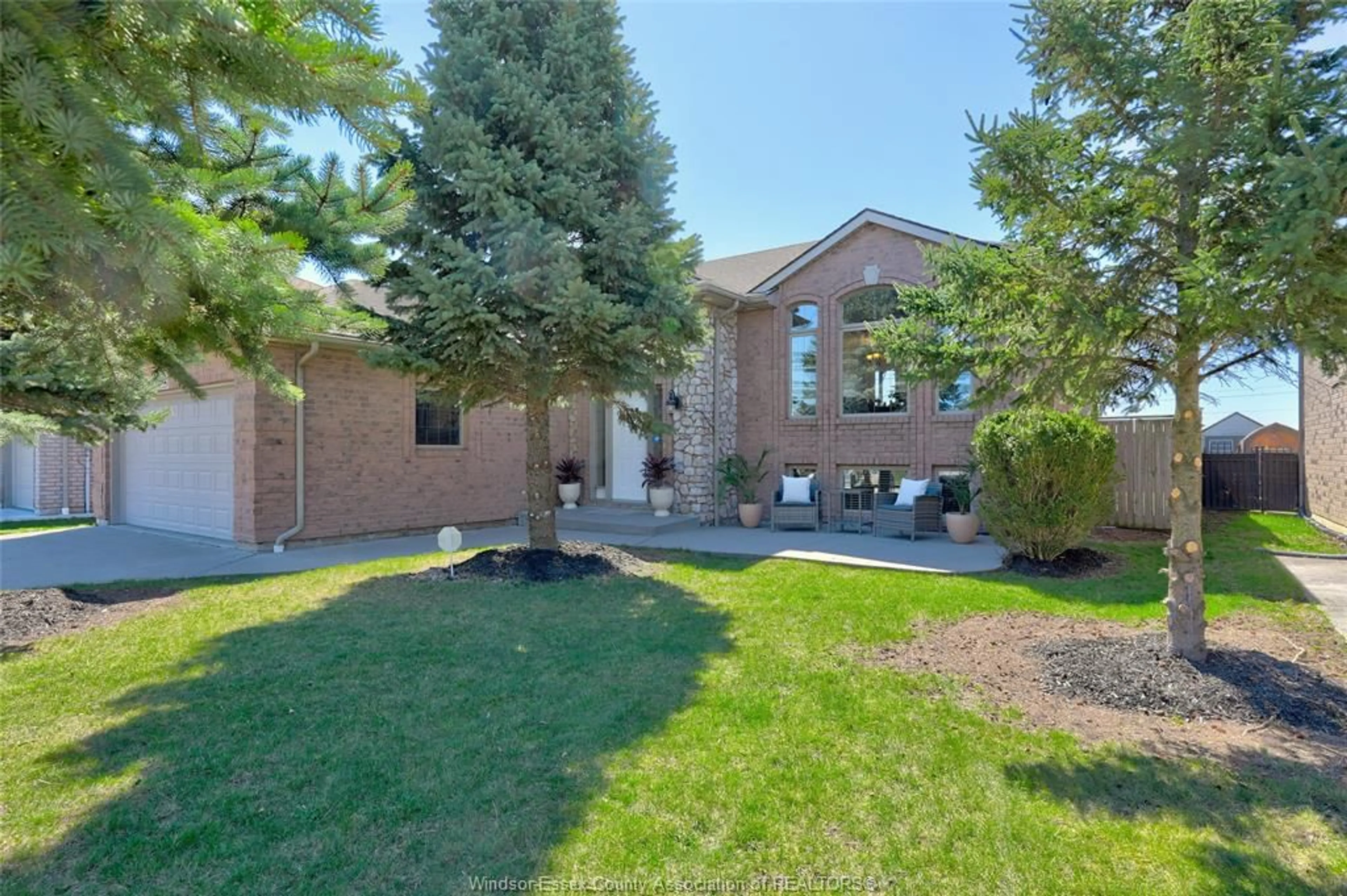 Home with brick exterior material, street for 861 SOUTHWOOD Dr, Lakeshore Ontario N8L 1G1