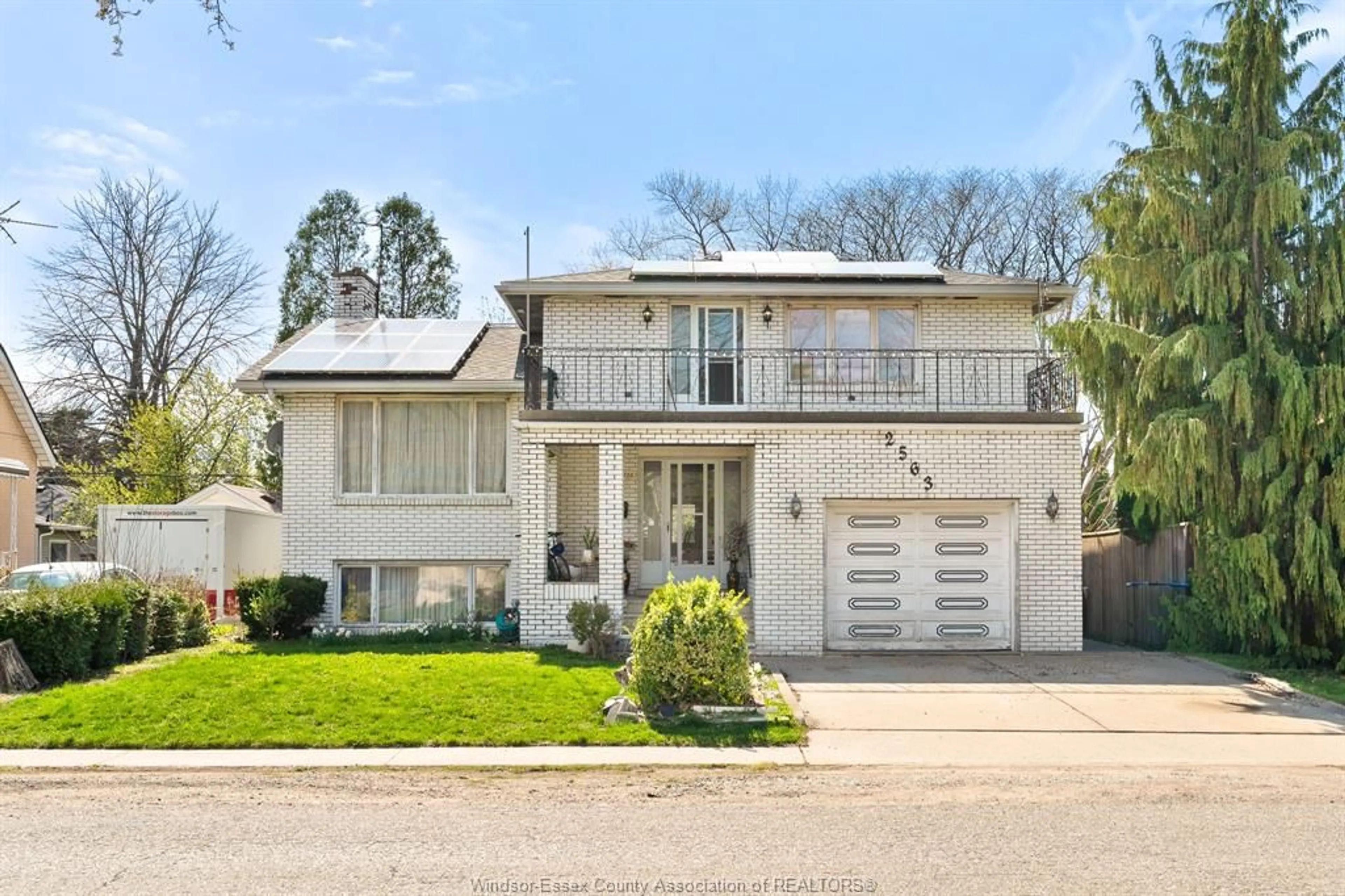 Home with brick exterior material, street for 2563 ROSSINI Blvd, Windsor Ontario N8W 4R2