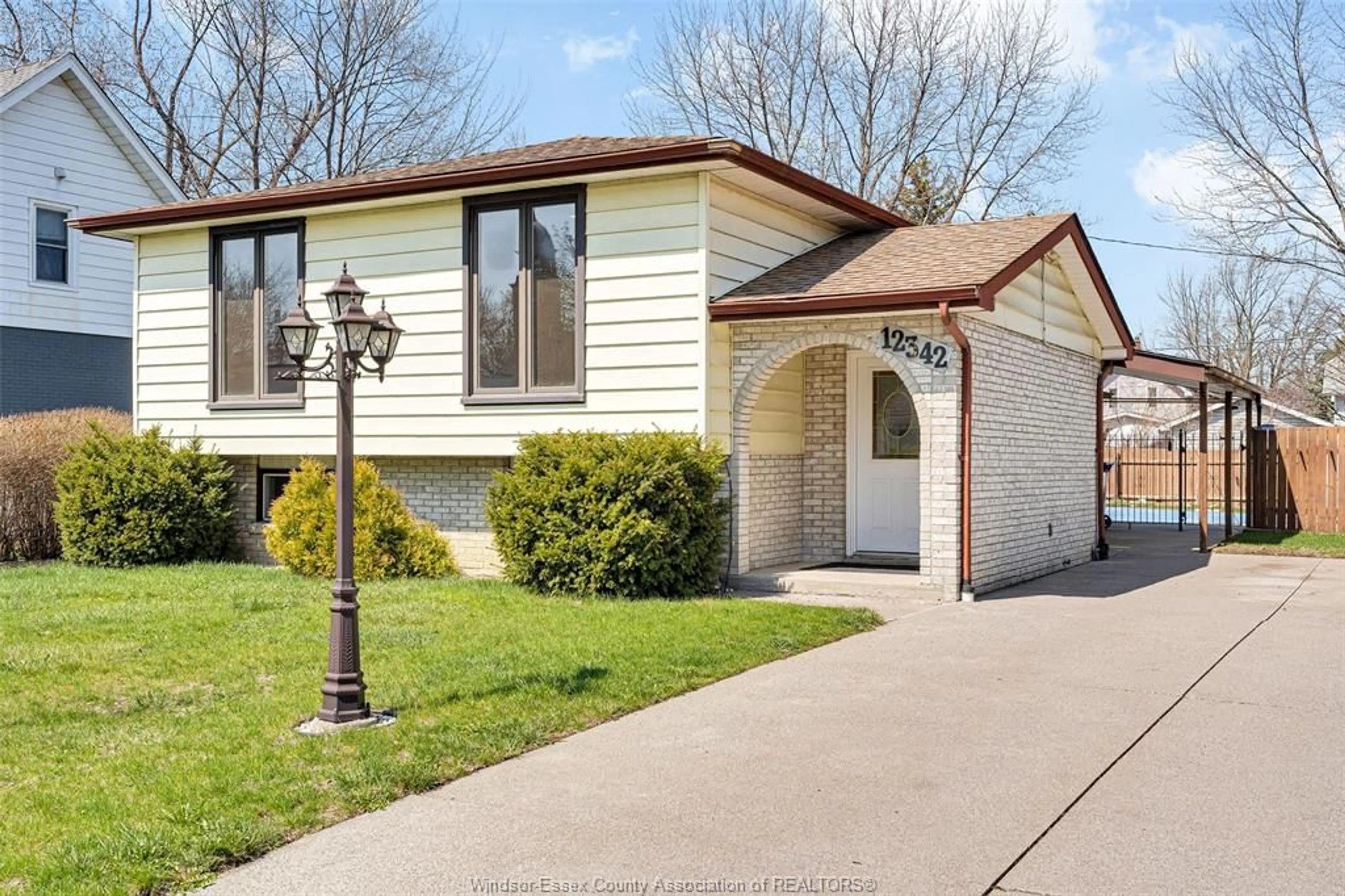 Home with vinyl exterior material, street for 12342 LACHANCE Crt, Tecumseh Ontario N8N 1L6