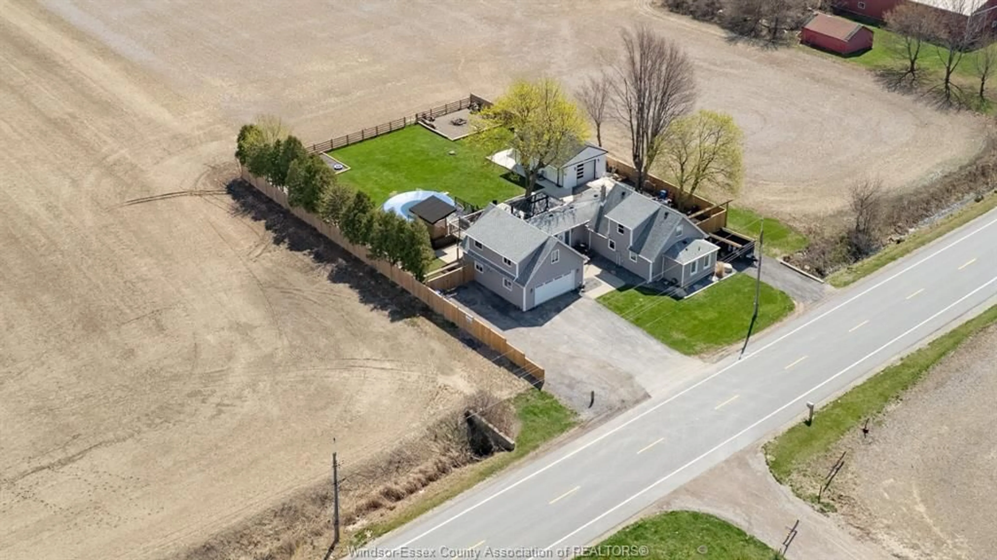 A pic from outside/outdoor area/front of a property/back of a property/a pic from drone, street for 1331 CONCESSION RD 2 N, Amherstburg Ontario N9V 3R3