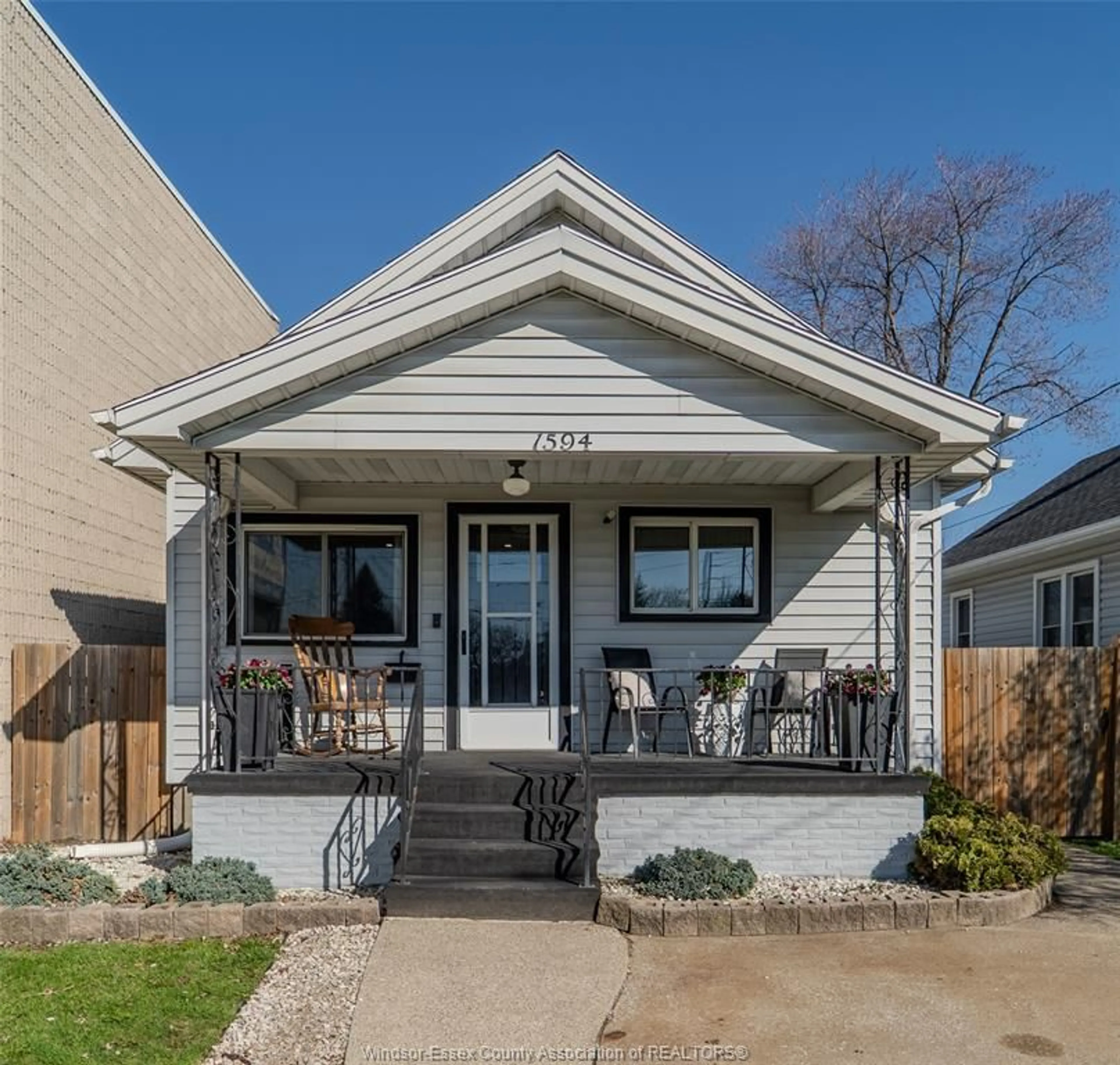 Home with vinyl exterior material, street for 1594 Tecumseh Rd, Windsor Ontario N9B 1T8