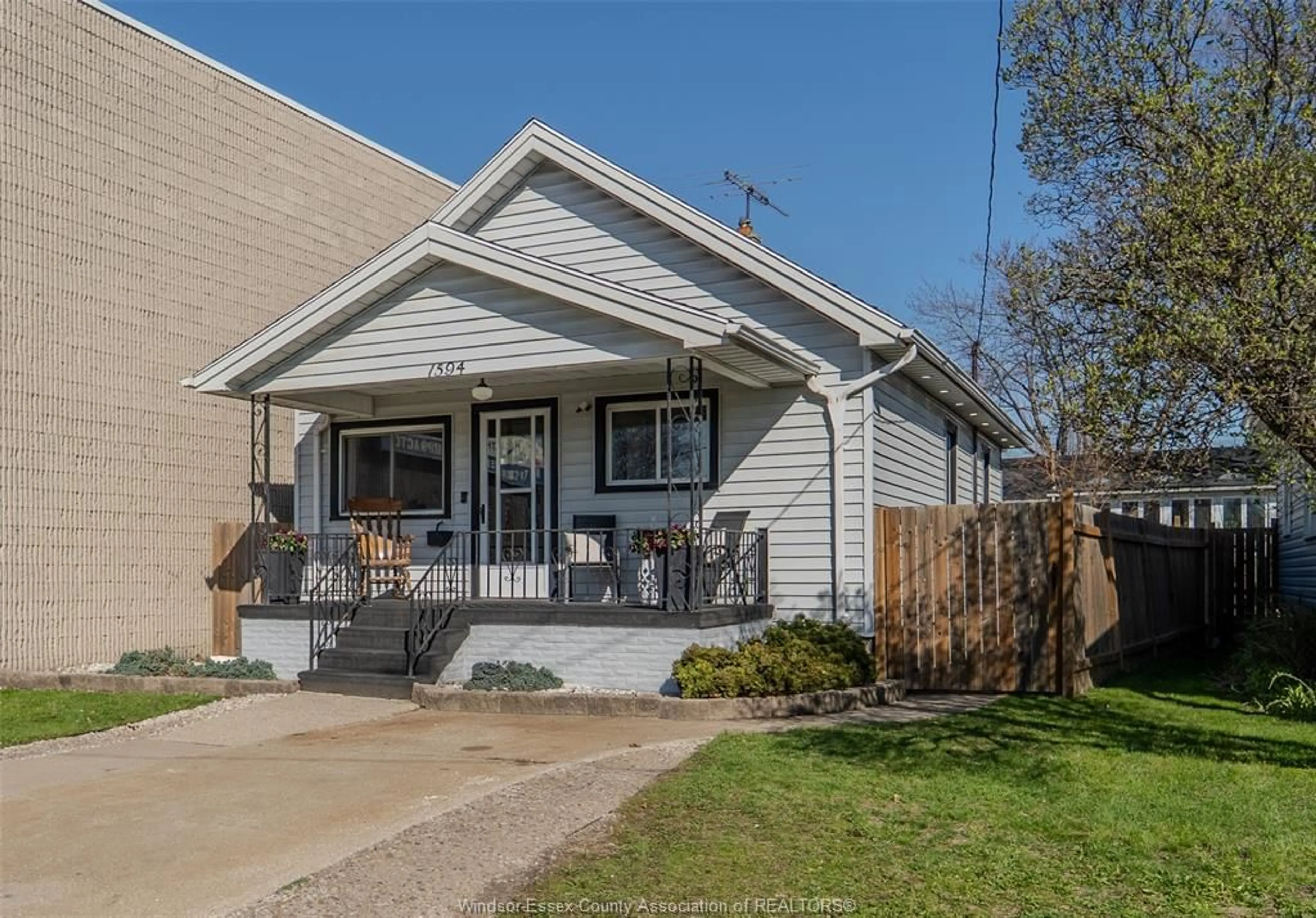 Home with vinyl exterior material, street for 1594 Tecumseh Rd, Windsor Ontario N9B 1T8