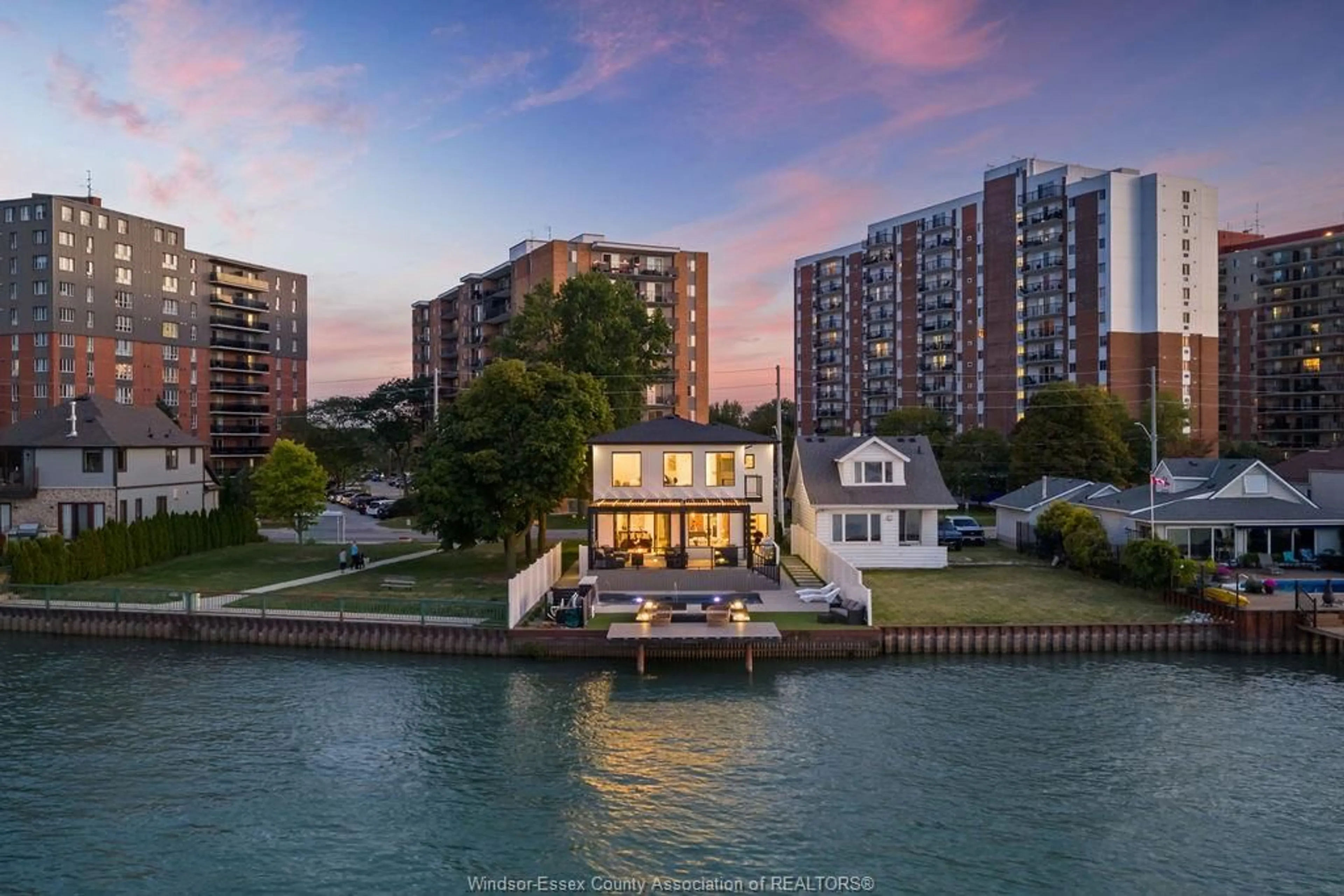 A pic from outside/outdoor area/front of a property/back of a property/a pic from drone, water/lake/river/ocean view for 8720 RIVERSIDE Dr, Windsor Ontario N8S 1E9