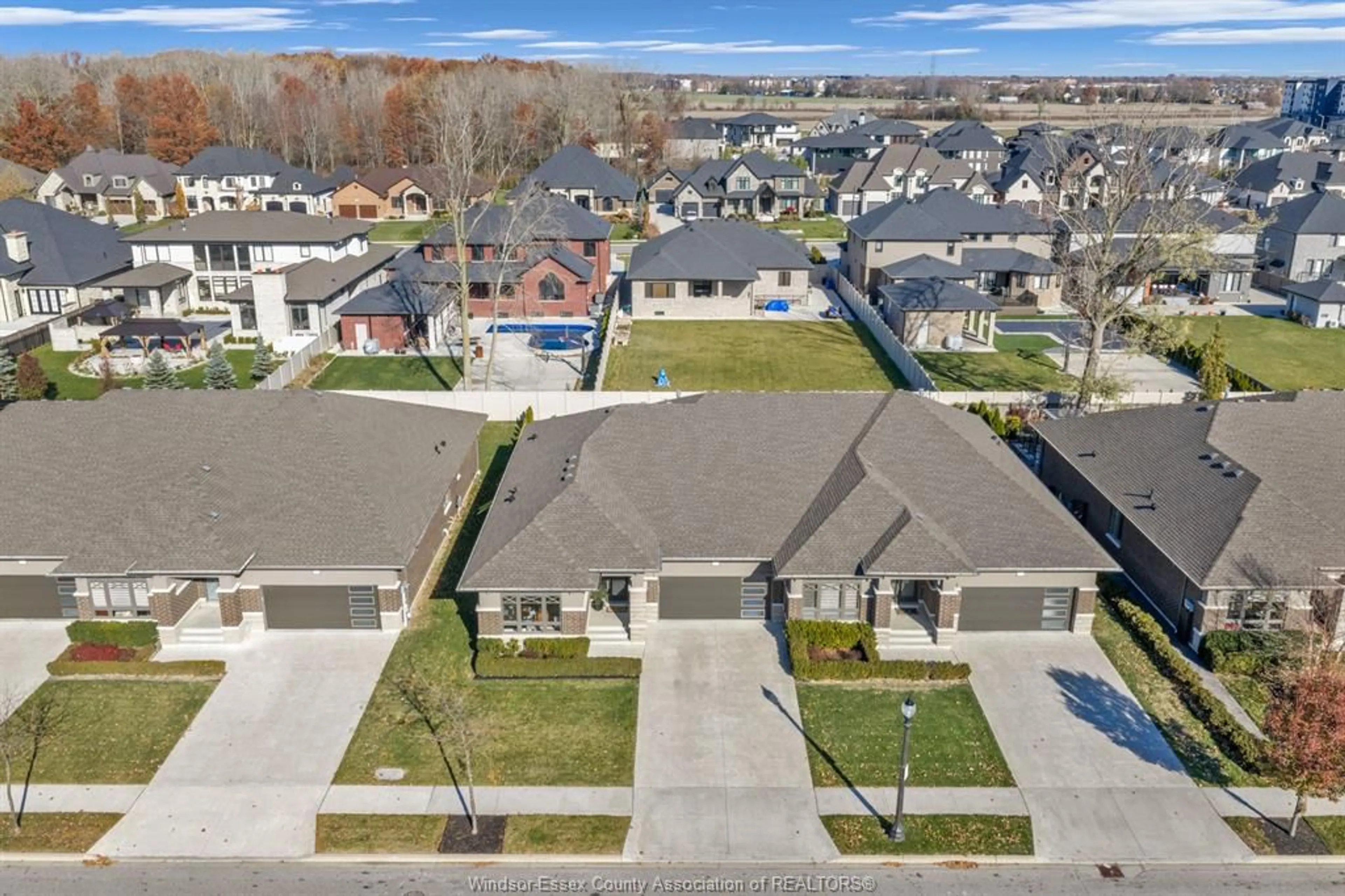 A pic from outside/outdoor area/front of a property/back of a property/a pic from drone, street for 3639 SEVEN LAKES Dr, LaSalle Ontario N9H 0E5