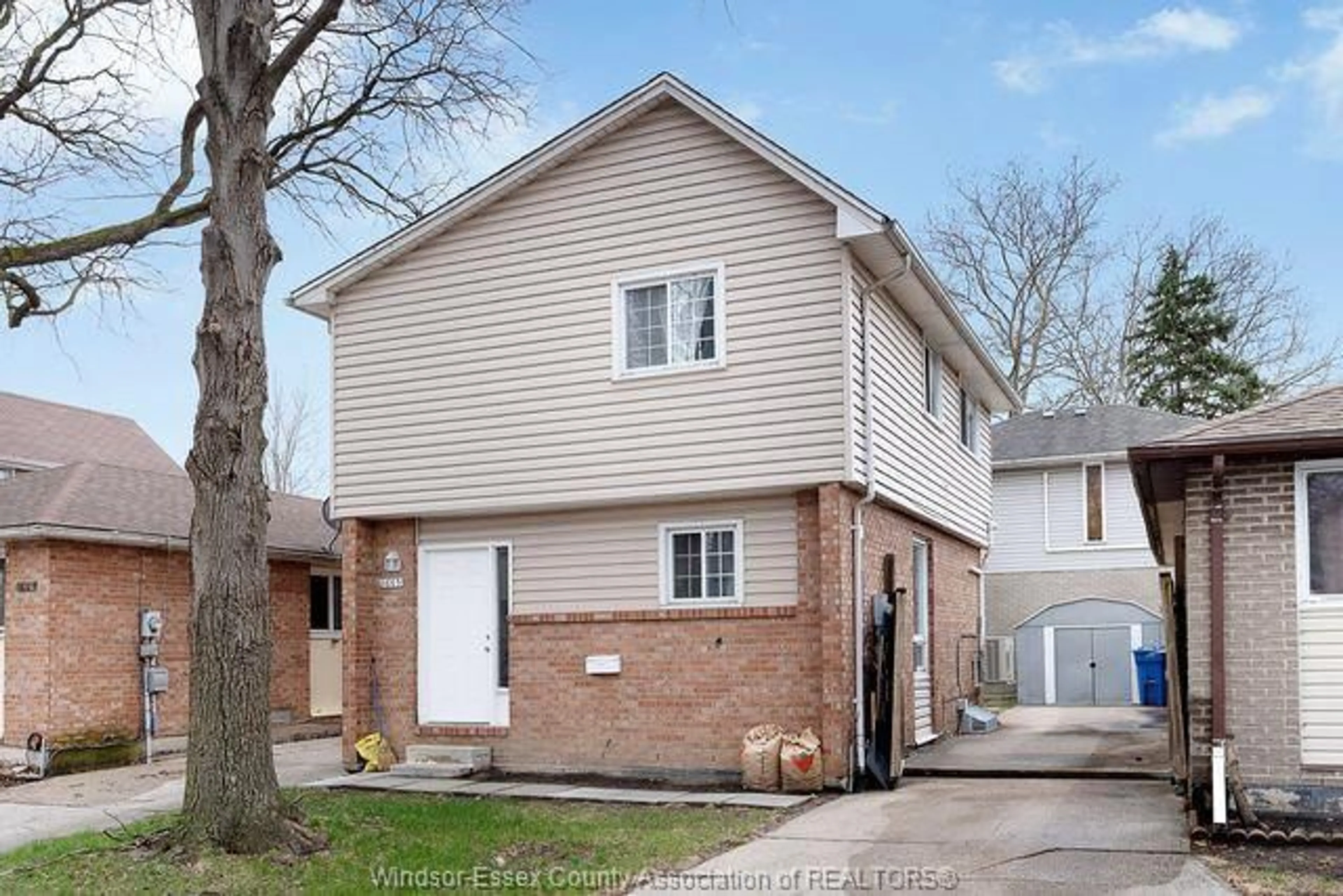 Home with brick exterior material, street for 8665 DARLINGTON Cres, Windsor Ontario N8S 4M5