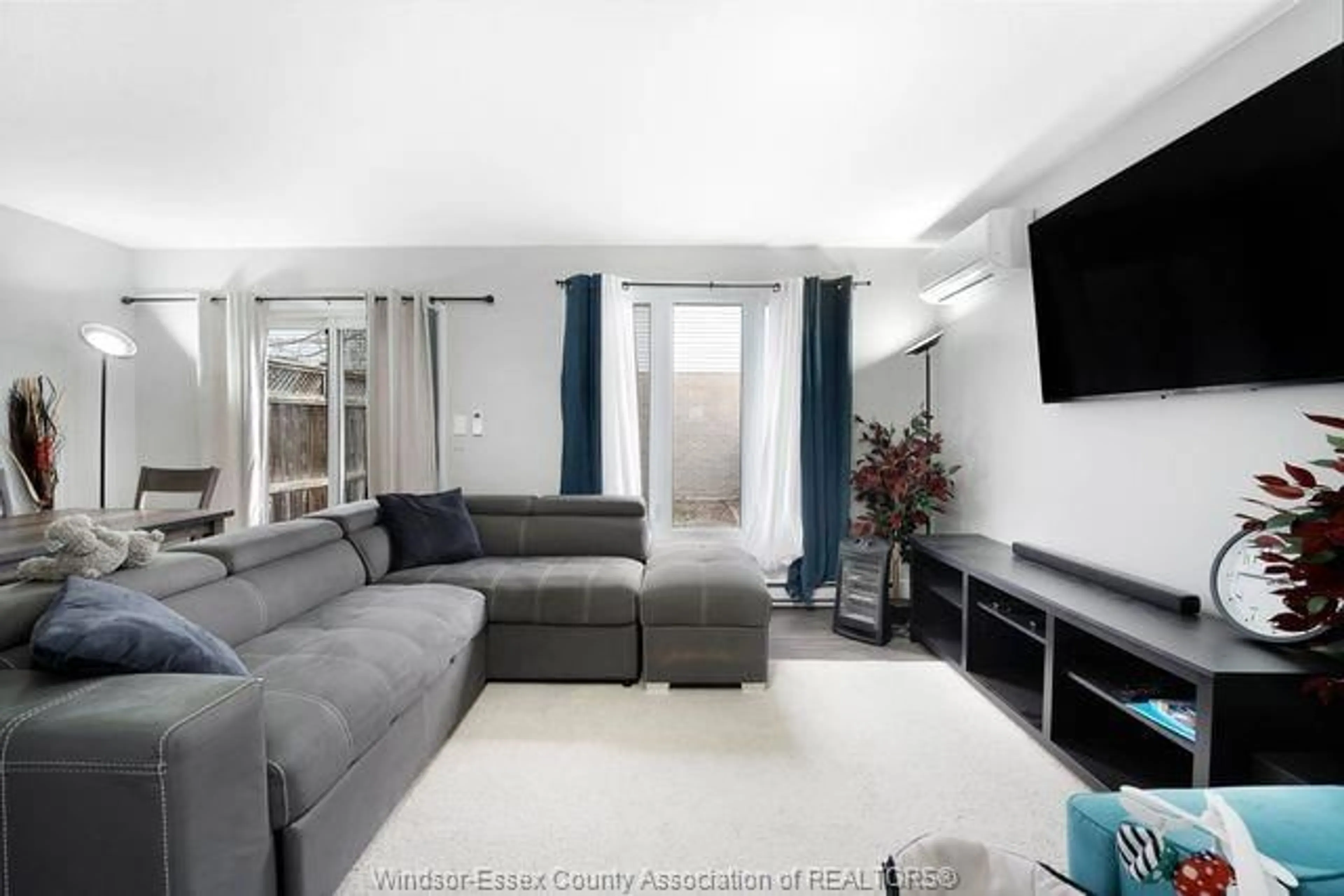 Living room with furniture, unknown for 8665 DARLINGTON Cres, Windsor Ontario N8S 4M5