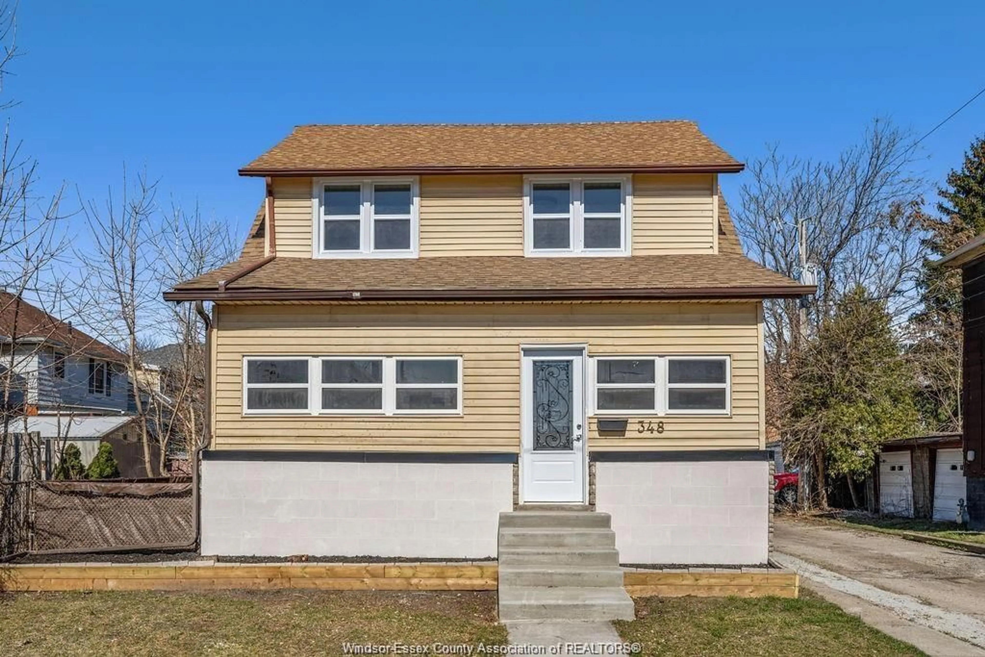 Home with vinyl exterior material, street for 348 CAROLINE, Windsor Ontario N9A 6A4
