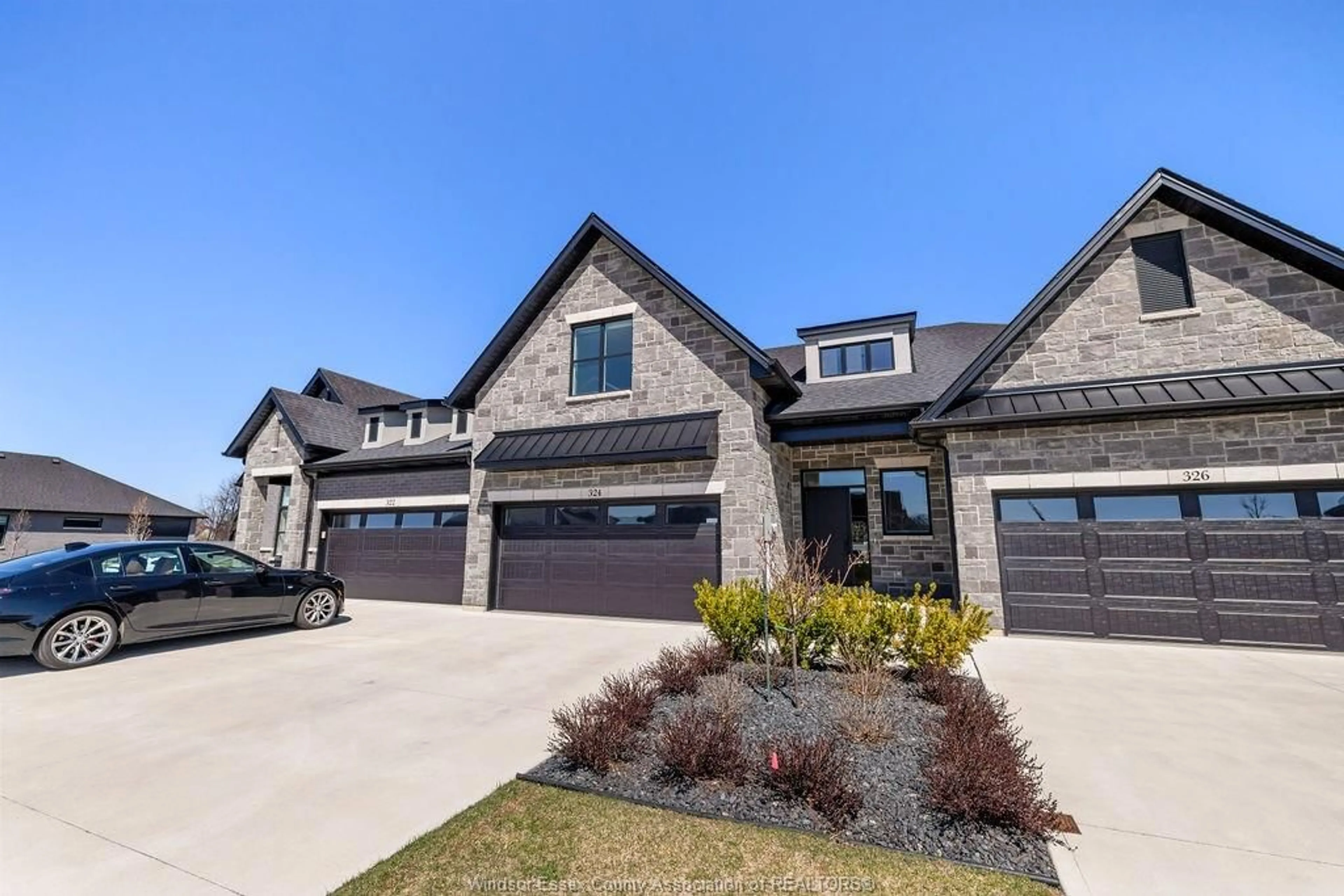 Home with brick exterior material, street for 324 JORDAN Lane, Lakeshore Ontario N8N 0J3