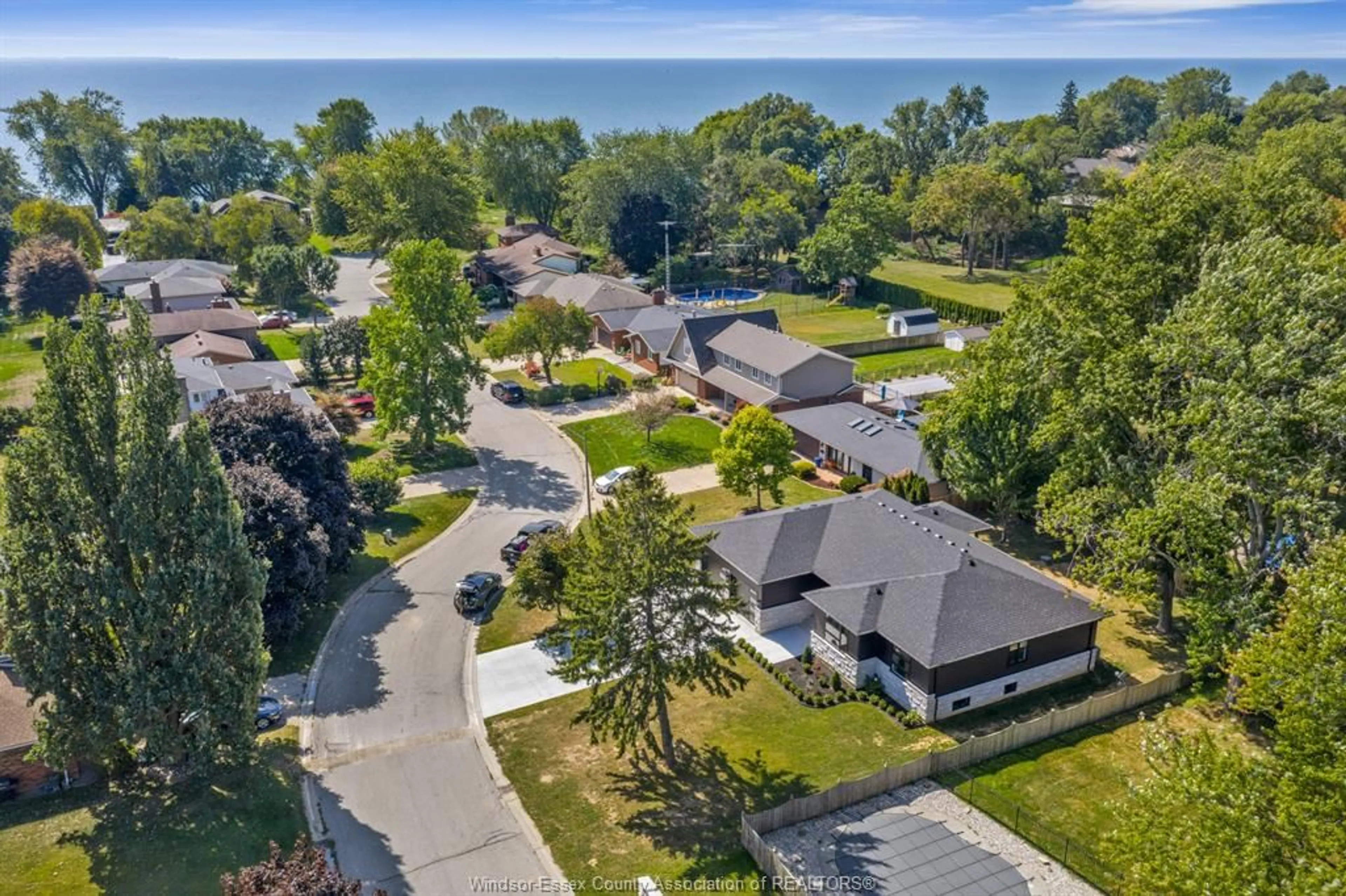 A pic from outside/outdoor area/front of a property/back of a property/a pic from drone, water/lake/river/ocean view for 1499 FULLER Dr, Kingsville Ontario N9Y 3M7