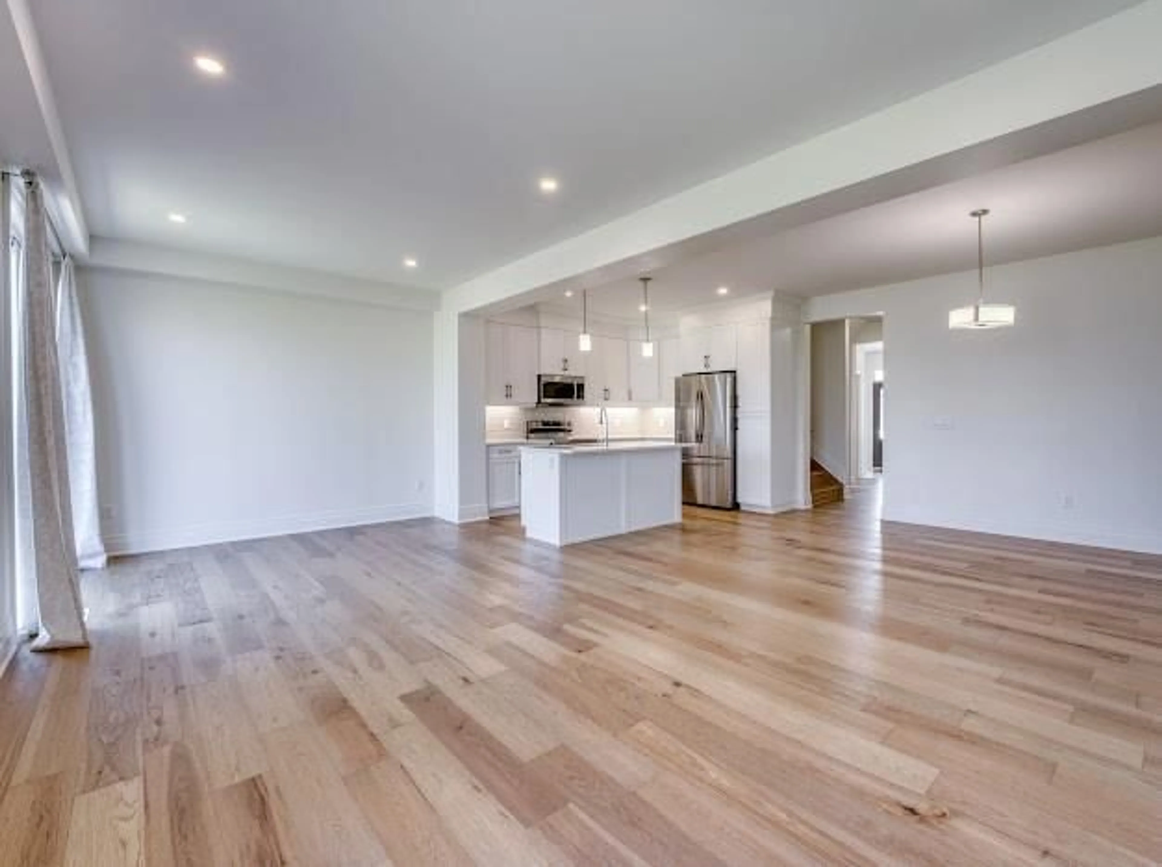 Open concept kitchen, wood/laminate floor for 116 LANE St, Essex Ontario K0A 3M0