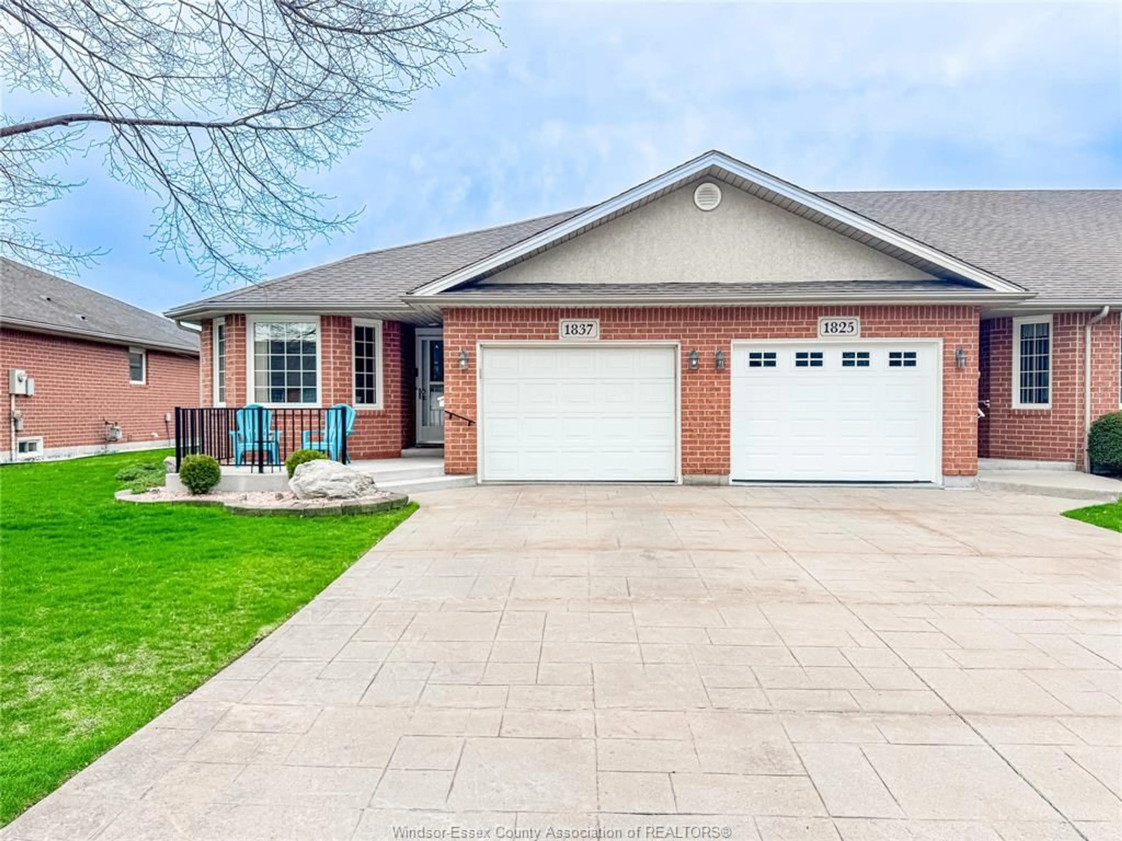 Home with brick exterior material, street for 1837 QUESTA Dr, Windsor Ontario N8P 1M5