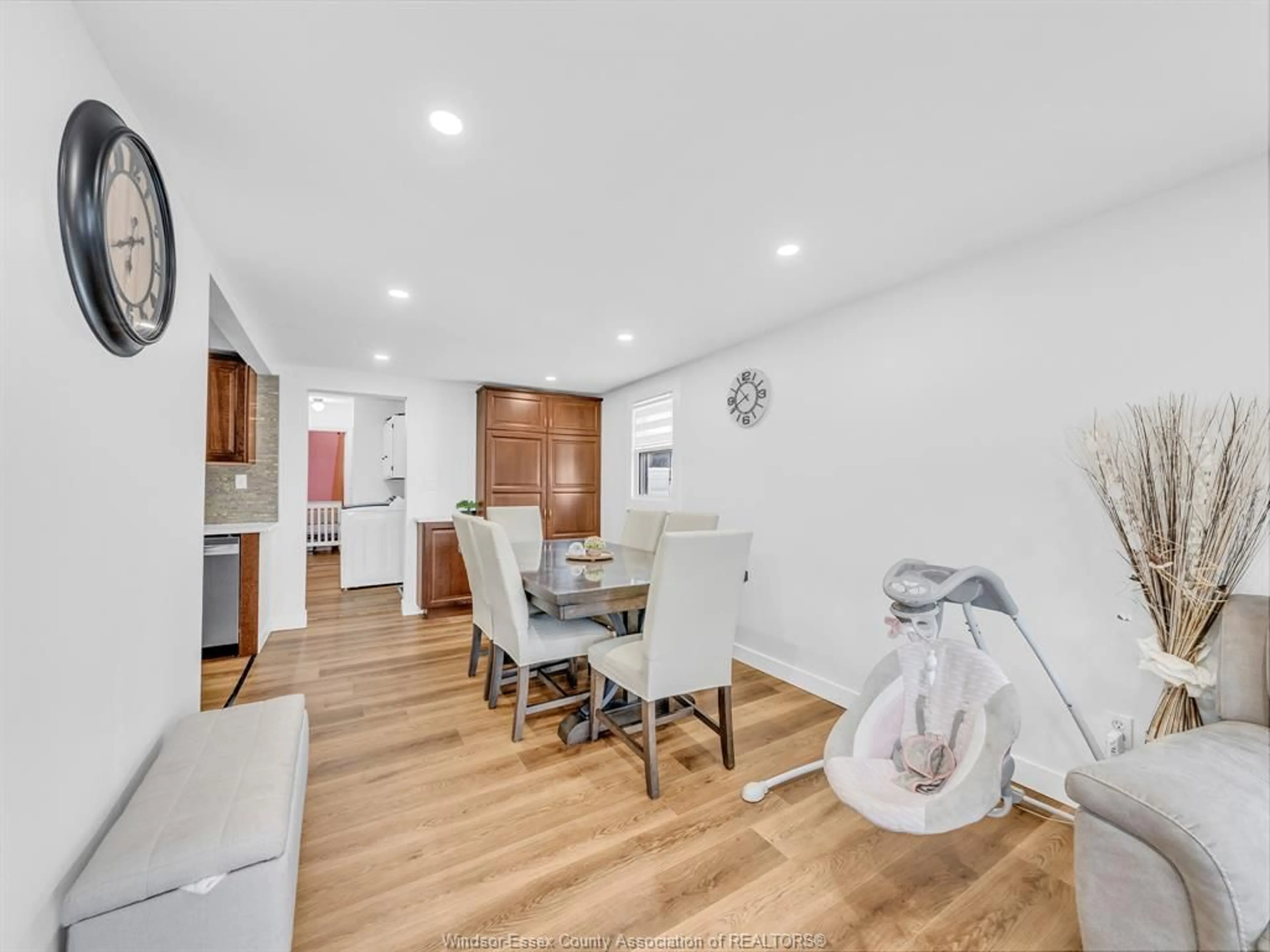 Open concept kitchen, wood/laminate floor for 792 Highway 77, Leamington Ontario N8H 3V8