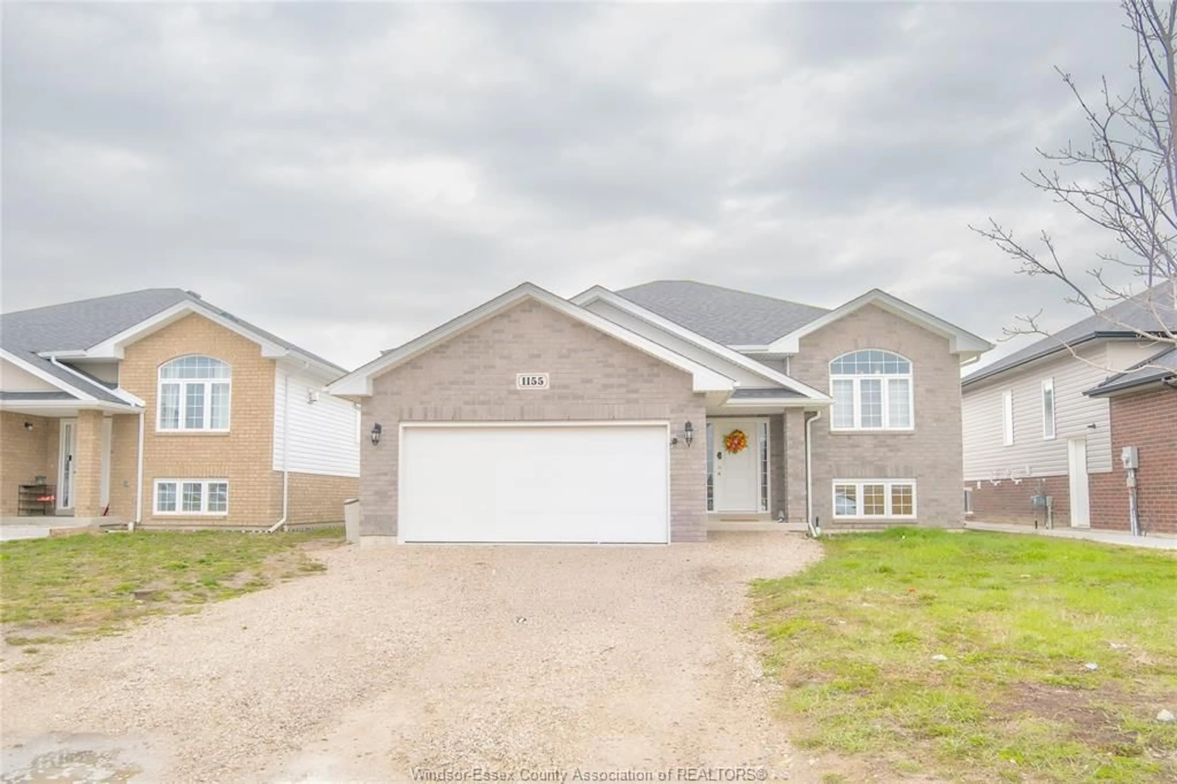 Home with brick exterior material, street for 1155 ASPEN RIDGE Cres, Lakeshore Ontario N0R 1A0