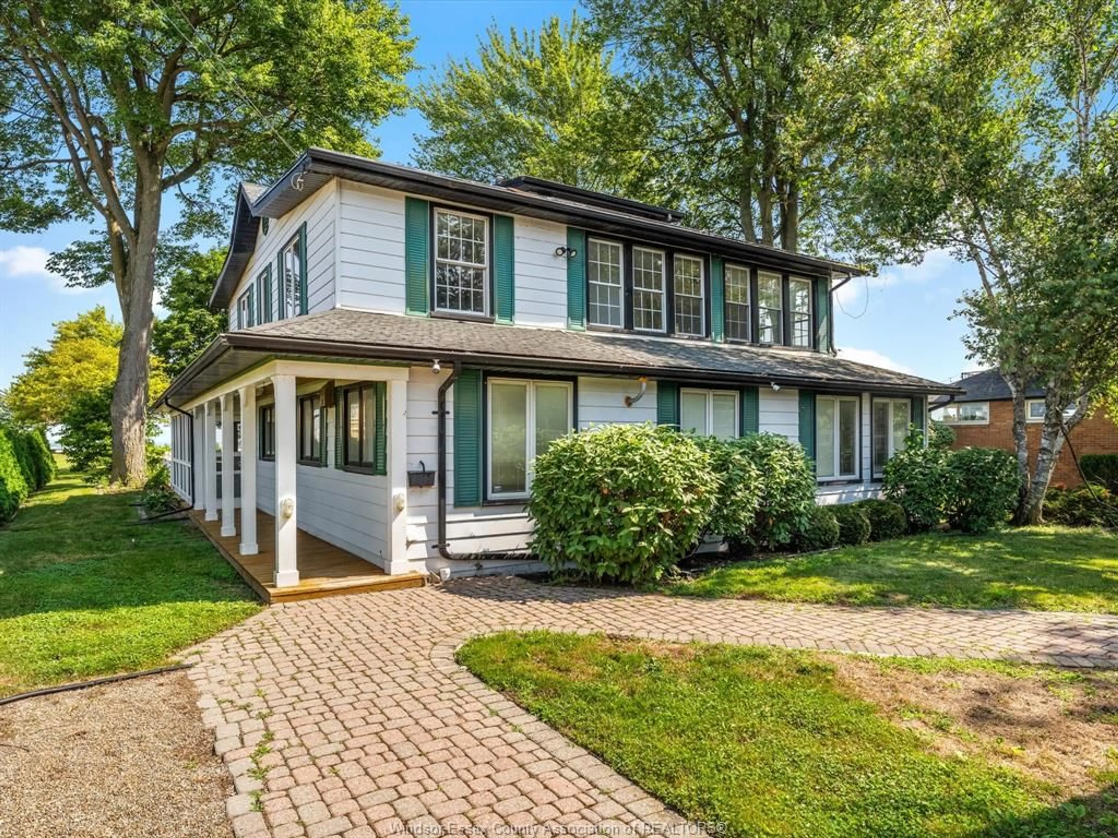 Home with vinyl exterior material, street for 13050 RIVERSIDE Dr, Tecumseh Ontario N8N 1A8