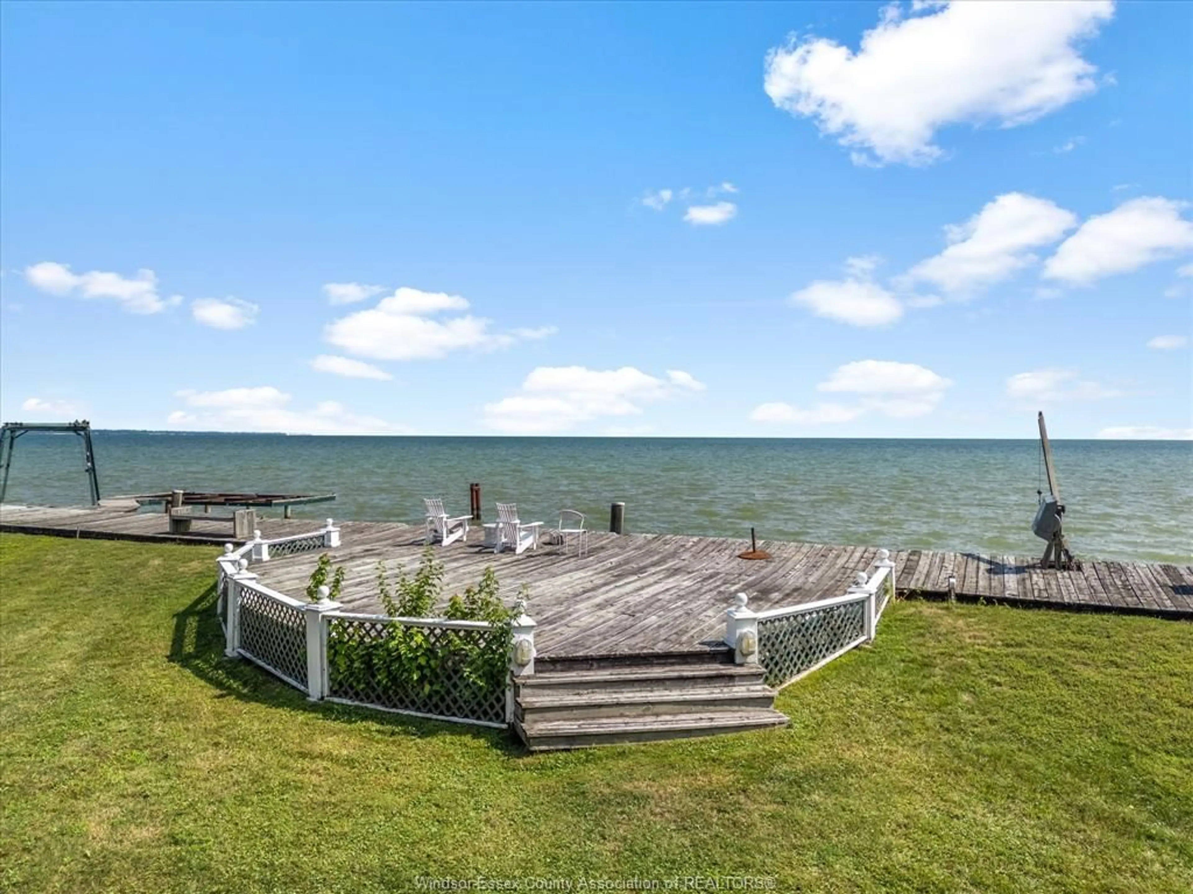 A pic from outside/outdoor area/front of a property/back of a property/a pic from drone, water/lake/river/ocean view for 13050 RIVERSIDE Dr, Tecumseh Ontario N8N 1A8