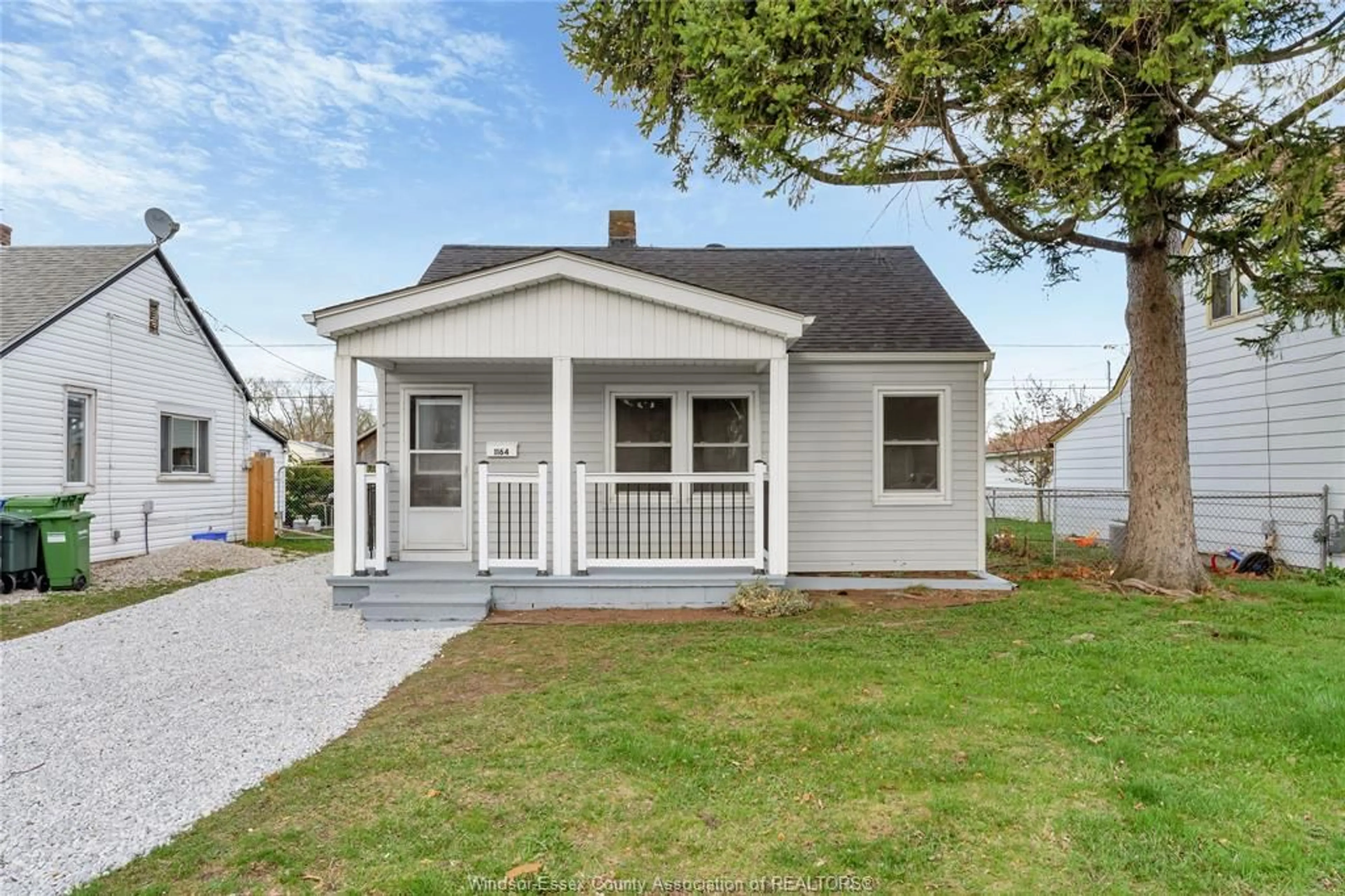 Home with vinyl exterior material, street for 1164 PARTINGTON Ave, Windsor Ontario N9B 2P4