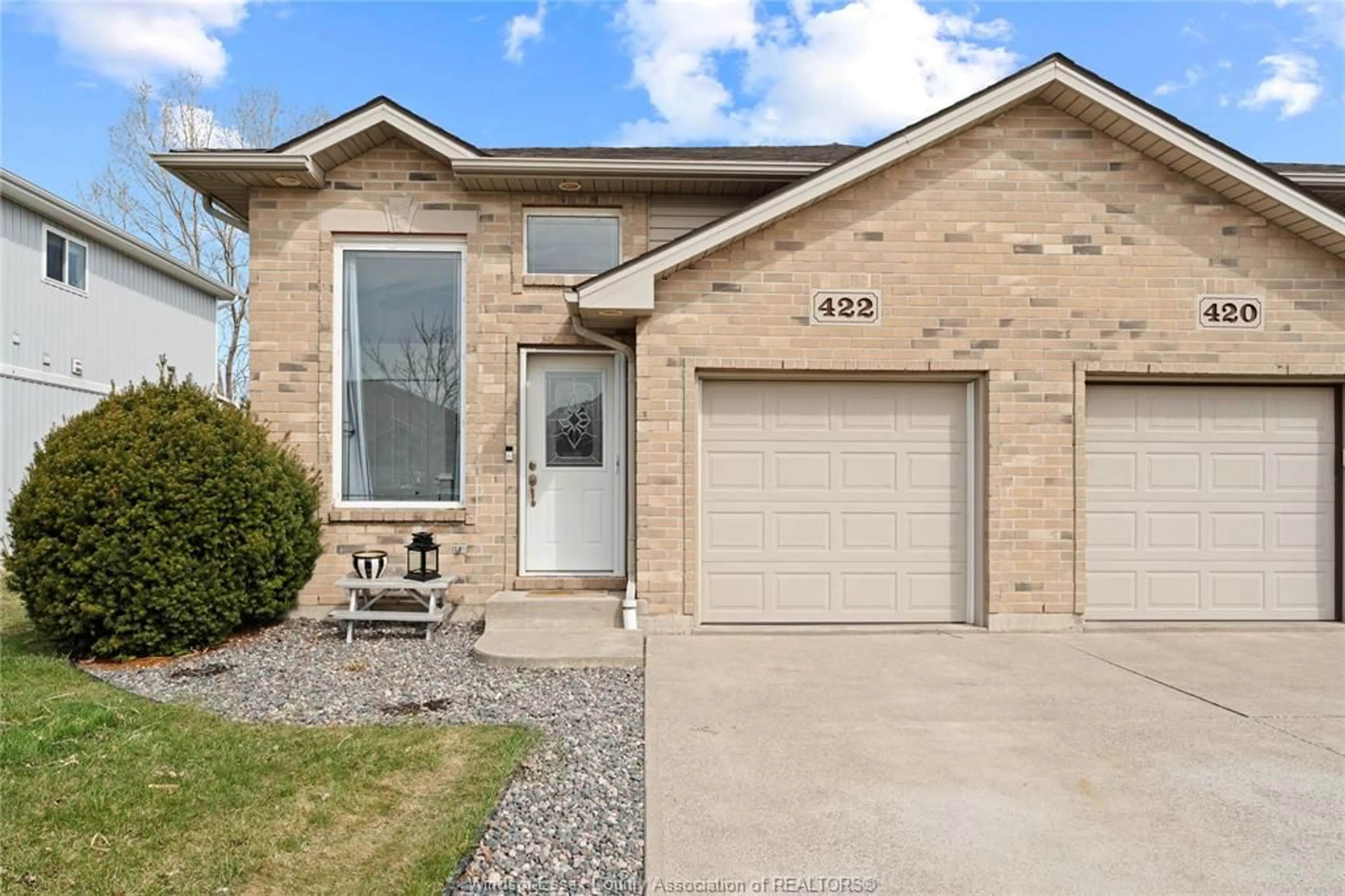 Home with brick exterior material, street for 422 ROSEWOOD Dr, Lakeshore Ontario N8L 1B9