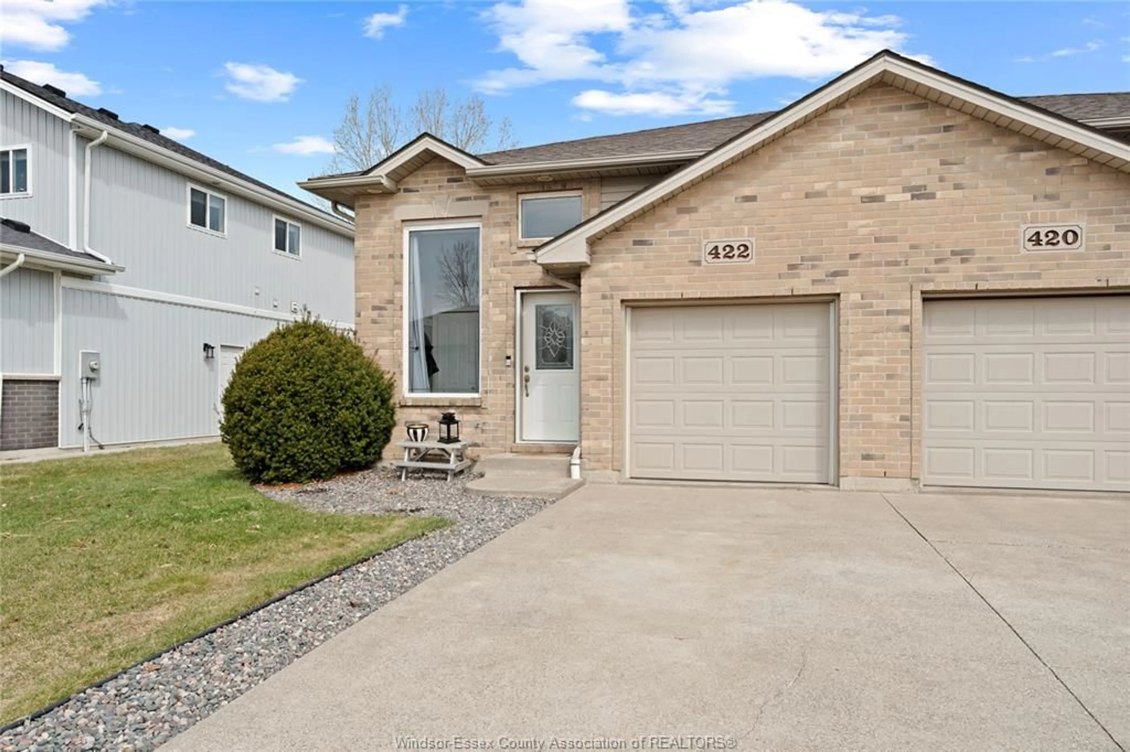 Home with brick exterior material, street for 422 ROSEWOOD Dr, Lakeshore Ontario N8L 1B9