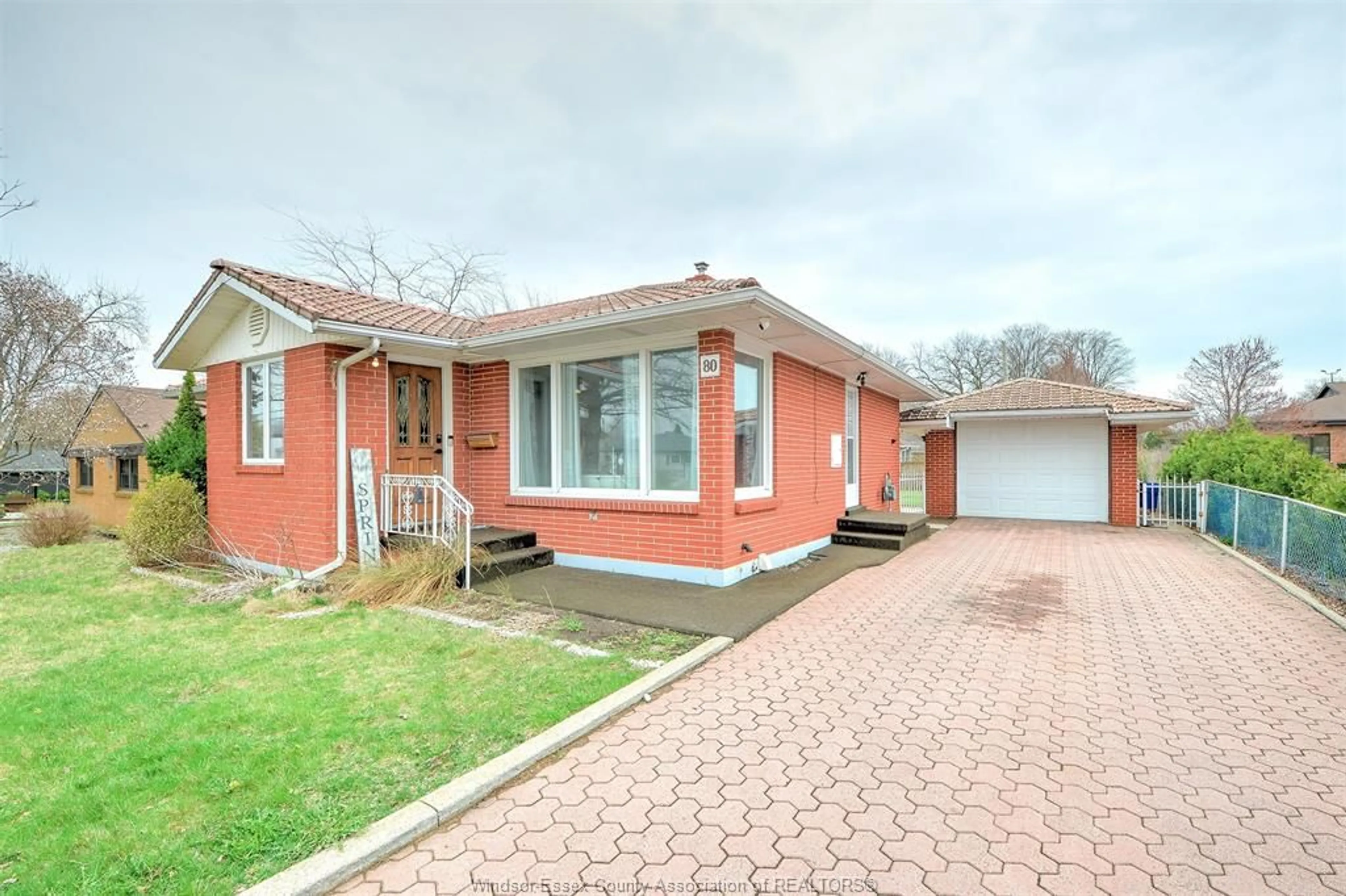 Home with brick exterior material, street for 80 OAK, Leamington Ontario N8H 2C6