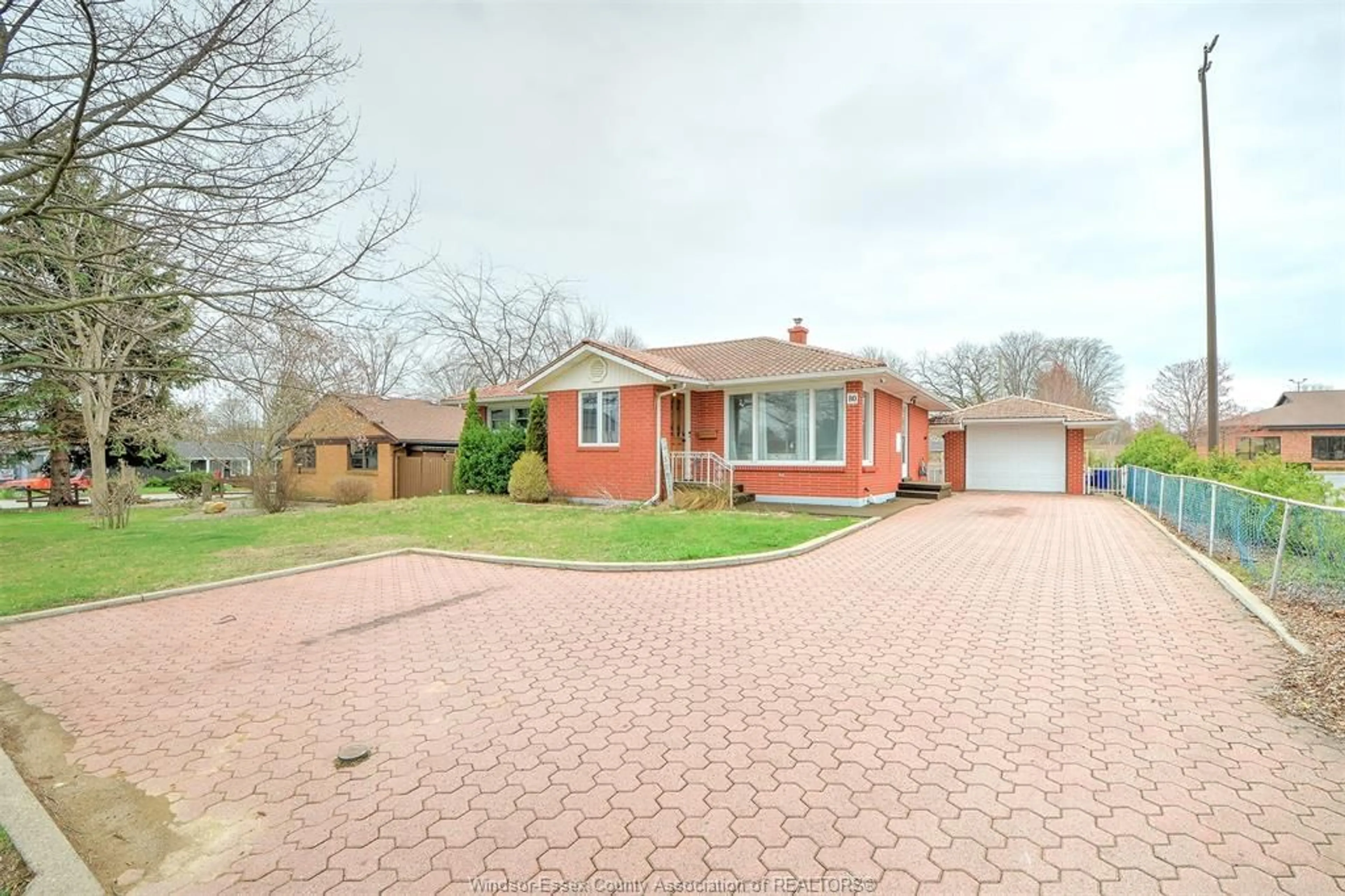 Home with brick exterior material, street for 80 OAK, Leamington Ontario N8H 2C6