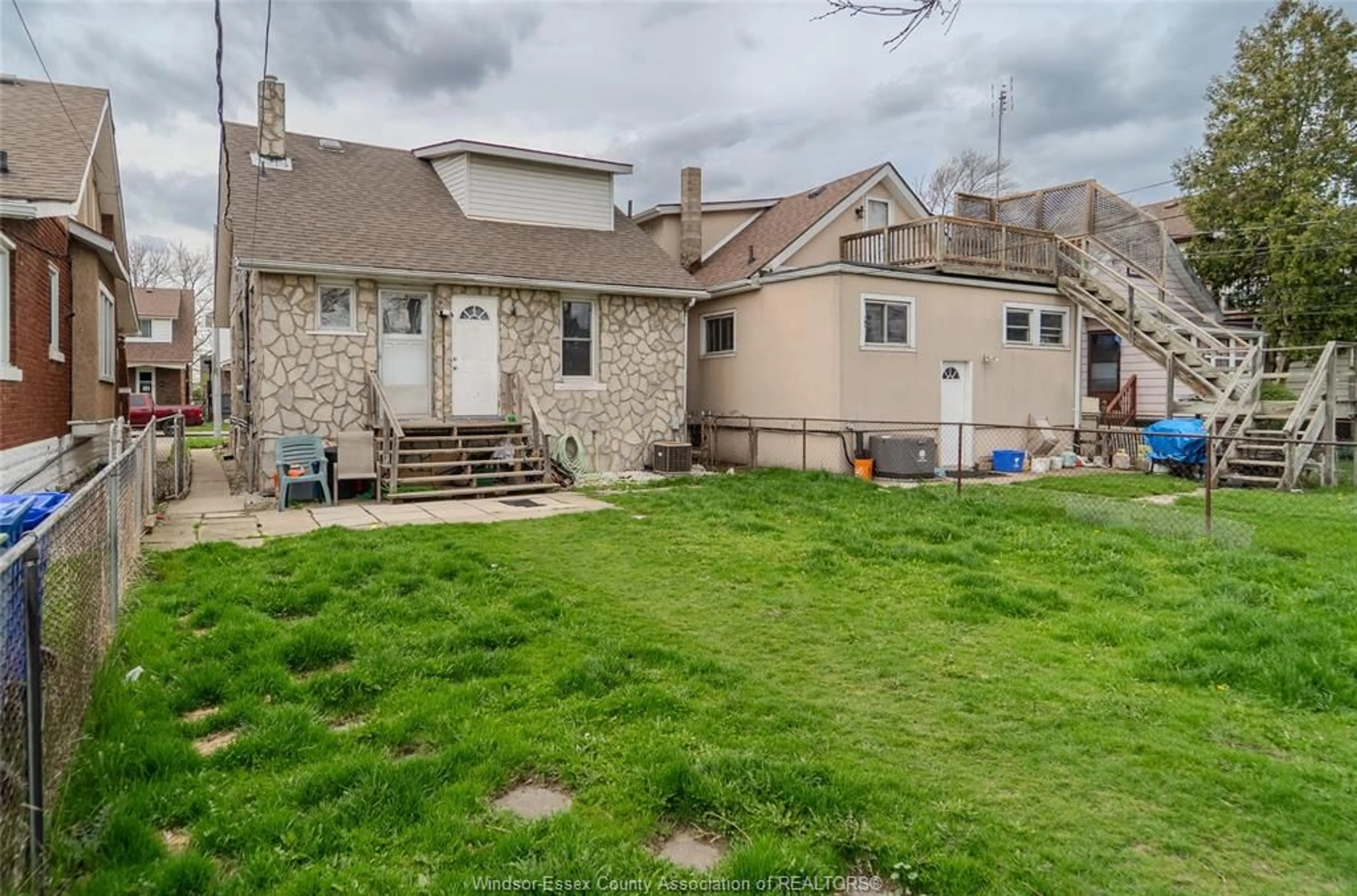 A pic from outside/outdoor area/front of a property/back of a property/a pic from drone, street for 1626 Hall Ave, Windsor Ontario N8X 4S1